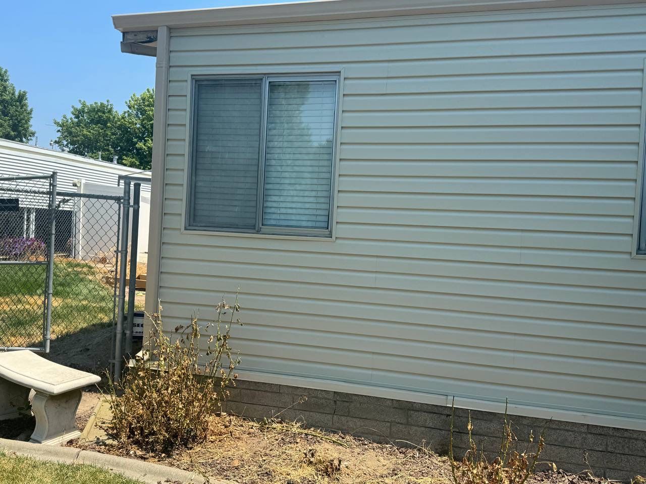 Salt Lake City | Targeted Vinyl Repair & Sheathing Update | Almond by Ideal Siding Utah