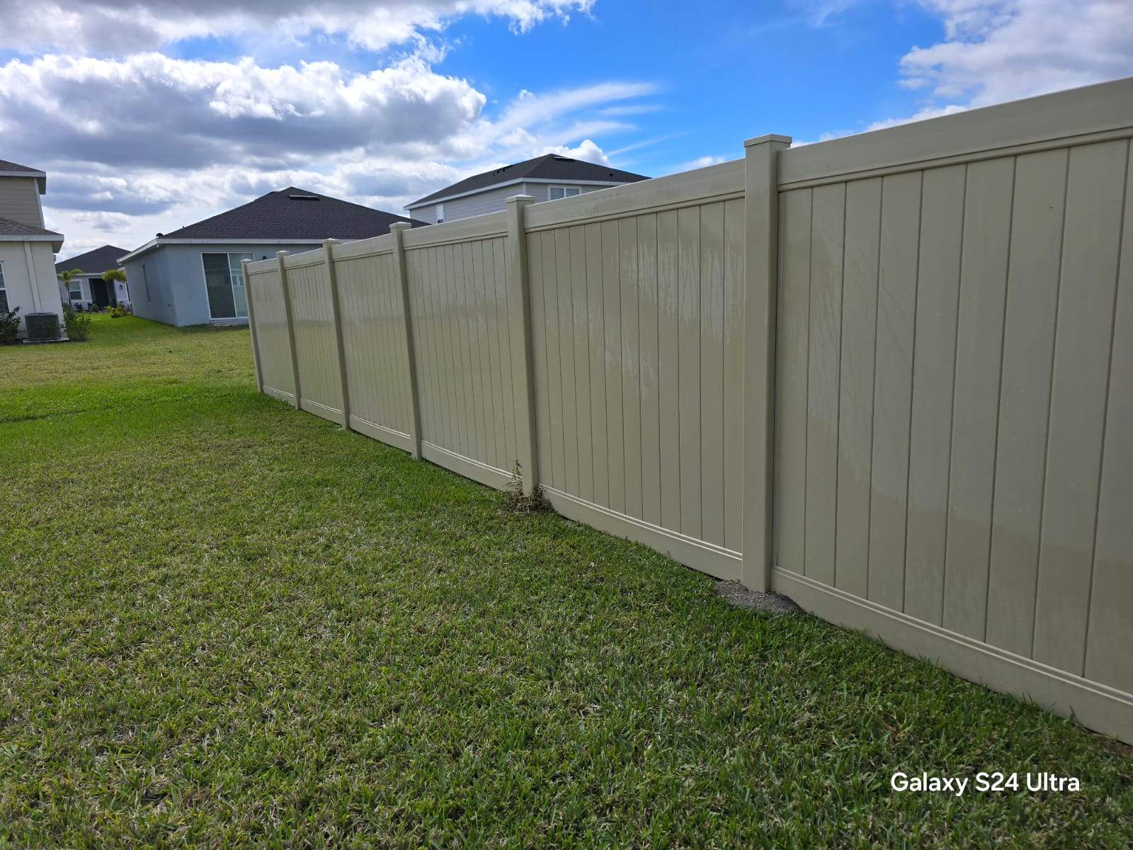 Tan Vinyl Privacy Fence Repair in Port Charlotte by True Fence LLC