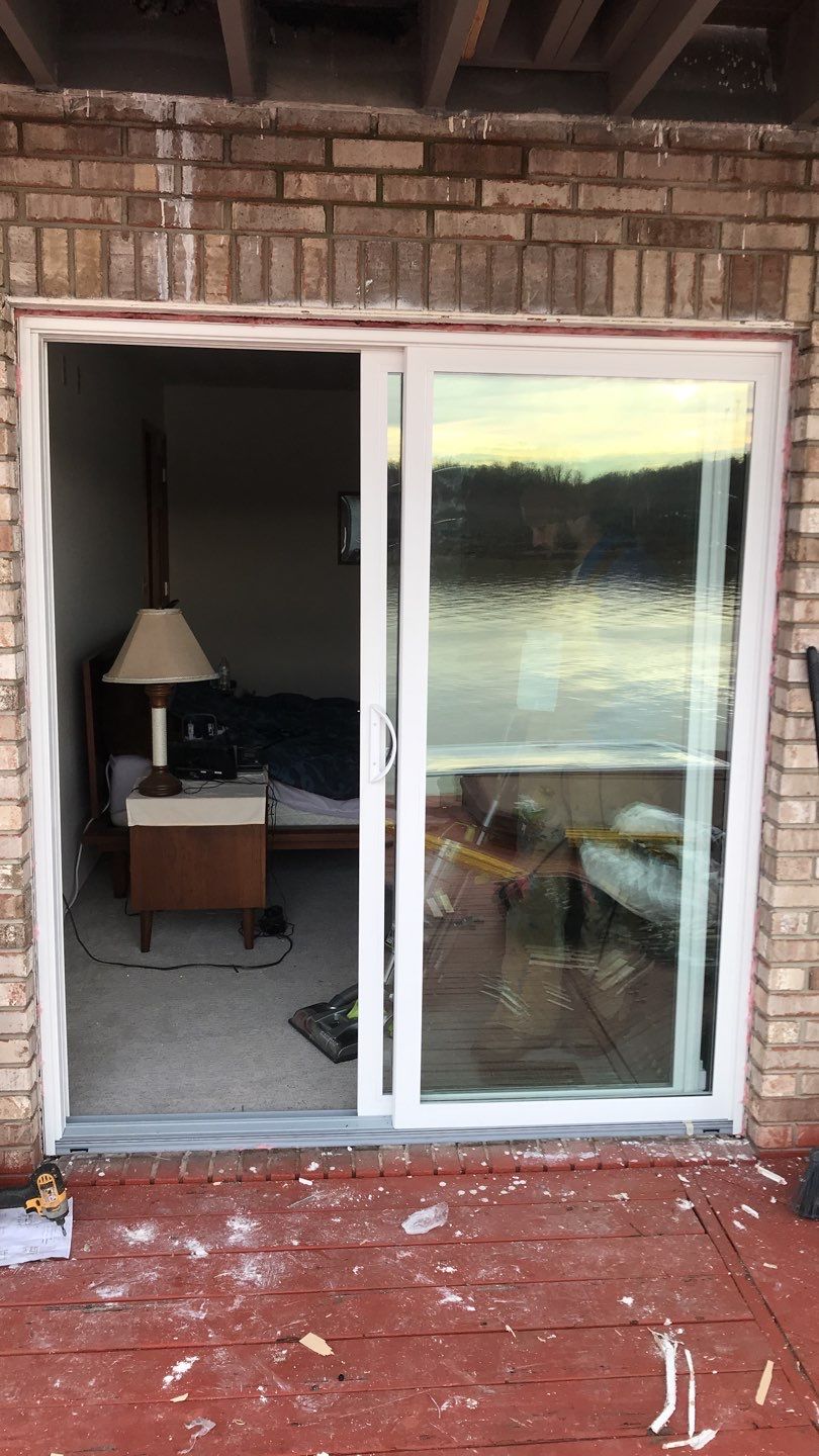 Deck Refurbush and Door Replacement using Trex Decking and Railing. Polaris Patio Doors by Secure Construction Company Inc