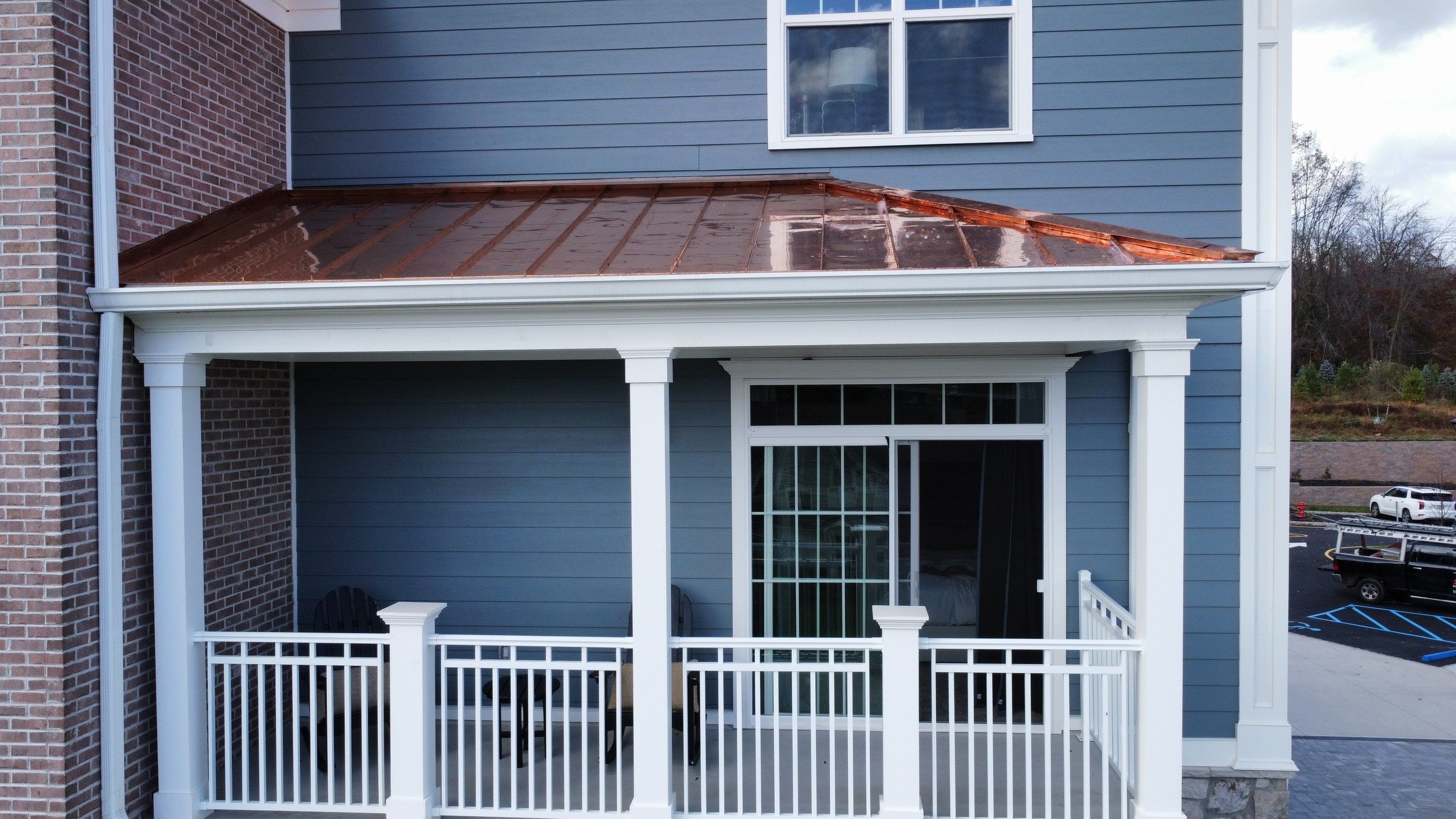 Standing Seam Metal Roof using Copper by CMNG LLC