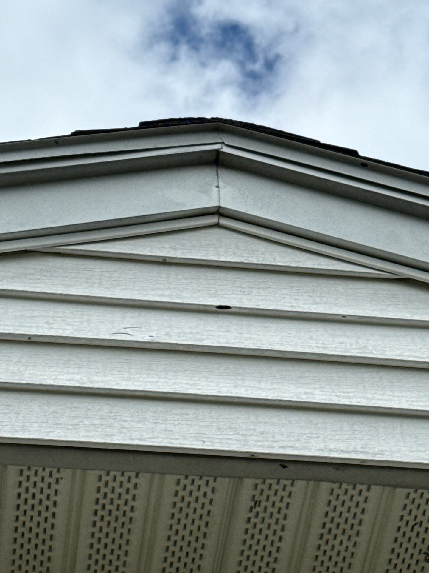 New roof & siding paid by insurance. Along with new roof sheathing.  by In & Out Construction & Remodeling, LLC