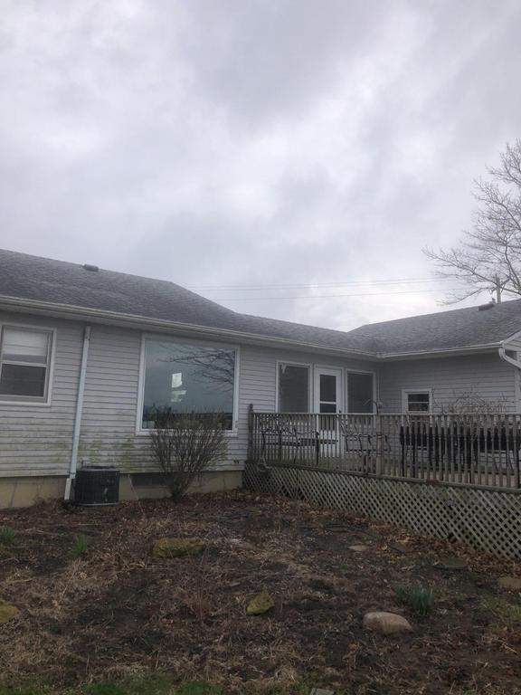 Storm damage roof replacement by Nitro Roofing and Construction