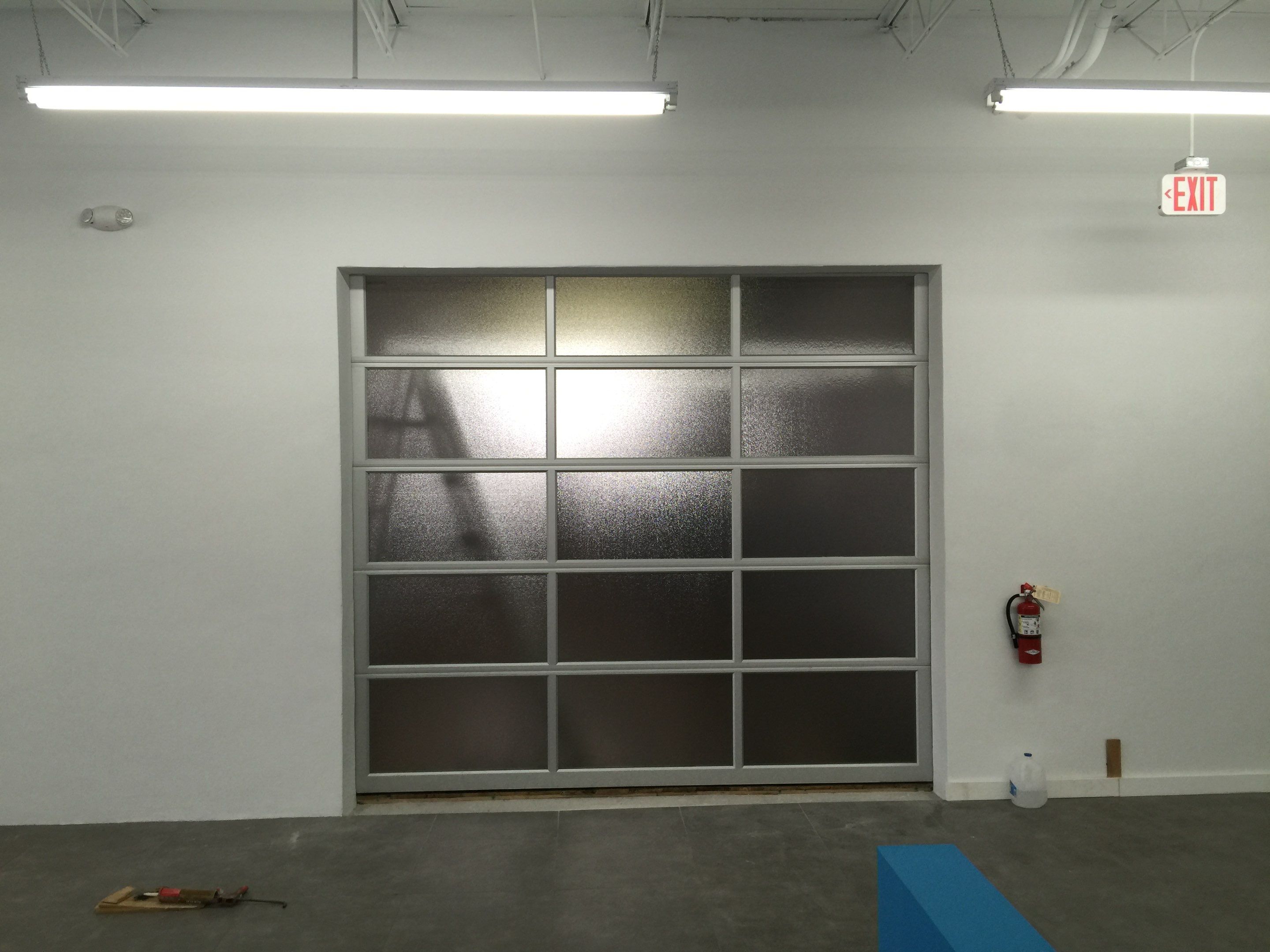 Clopay Avante, Aluminum and Glass Garage Door in Fort Lauderdale by The Door Doctor of South Florida, Inc.