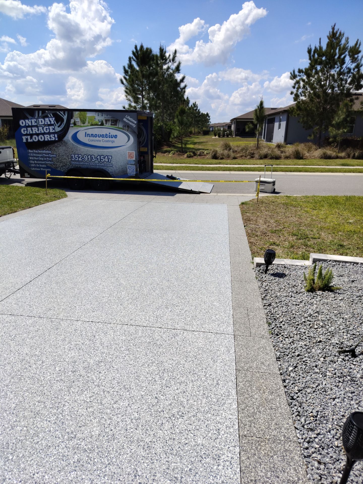 Driveway and Sidewalk in Slatestone with Silvercreek Border by Innovative Concrete Coatings 