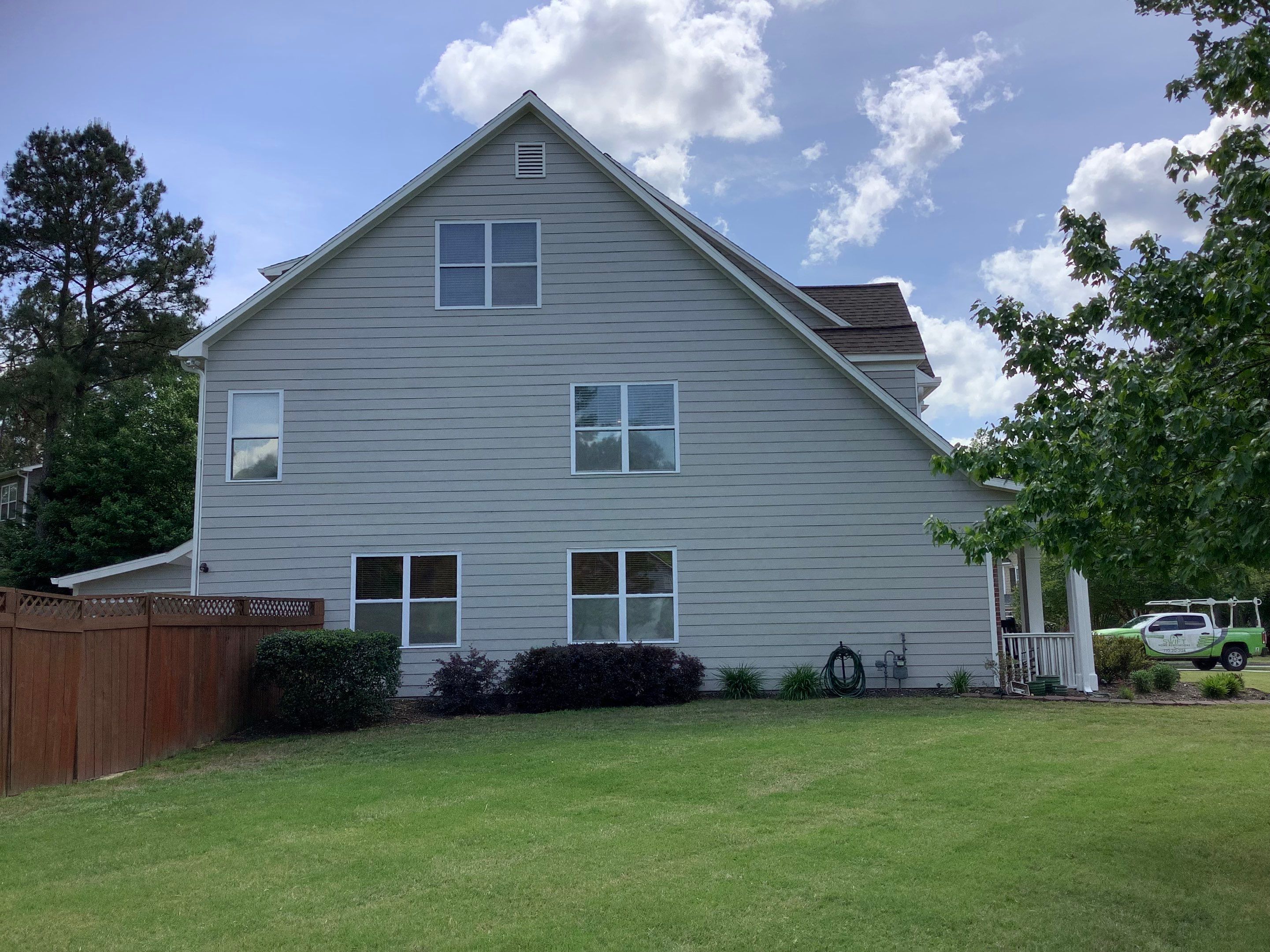 Exterior Home Refresh in Powder Springs with Gray Siding and White Trim by Swift Home Renovations
