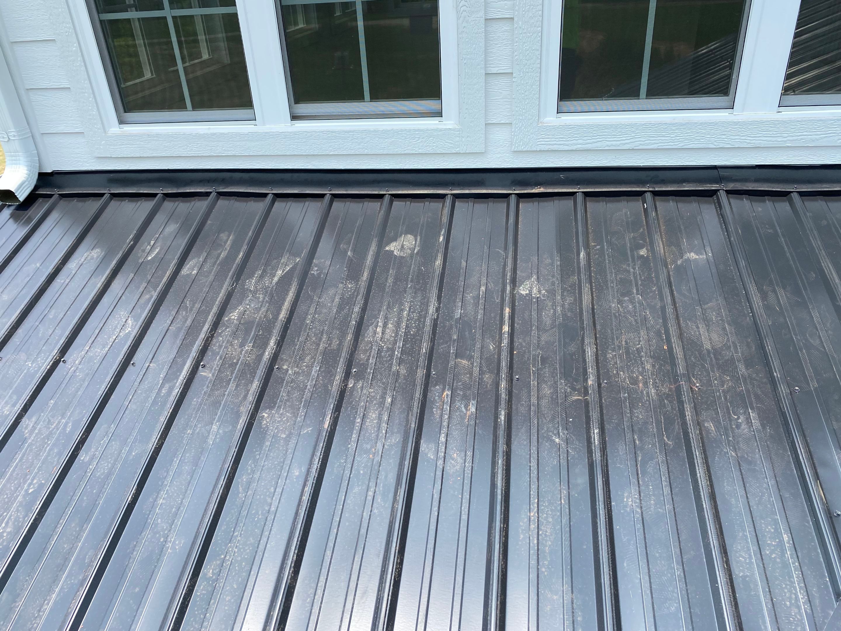 Jason's metal porch roof by BROCK BUILDERS 