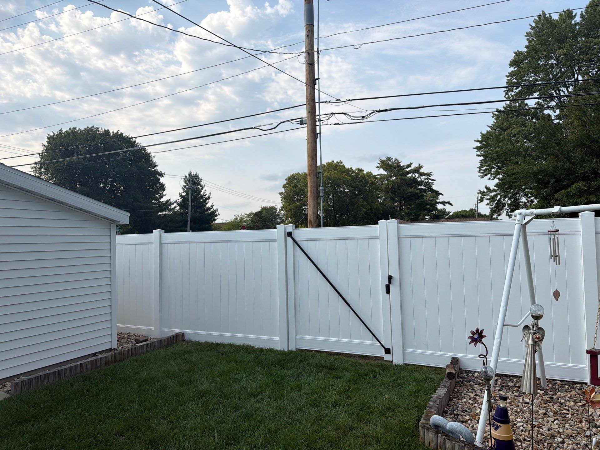 White Vinyl Privacy Fence Installation and Side Yard Upgrades in Waterloo by Perfect Picket Fence and Stain