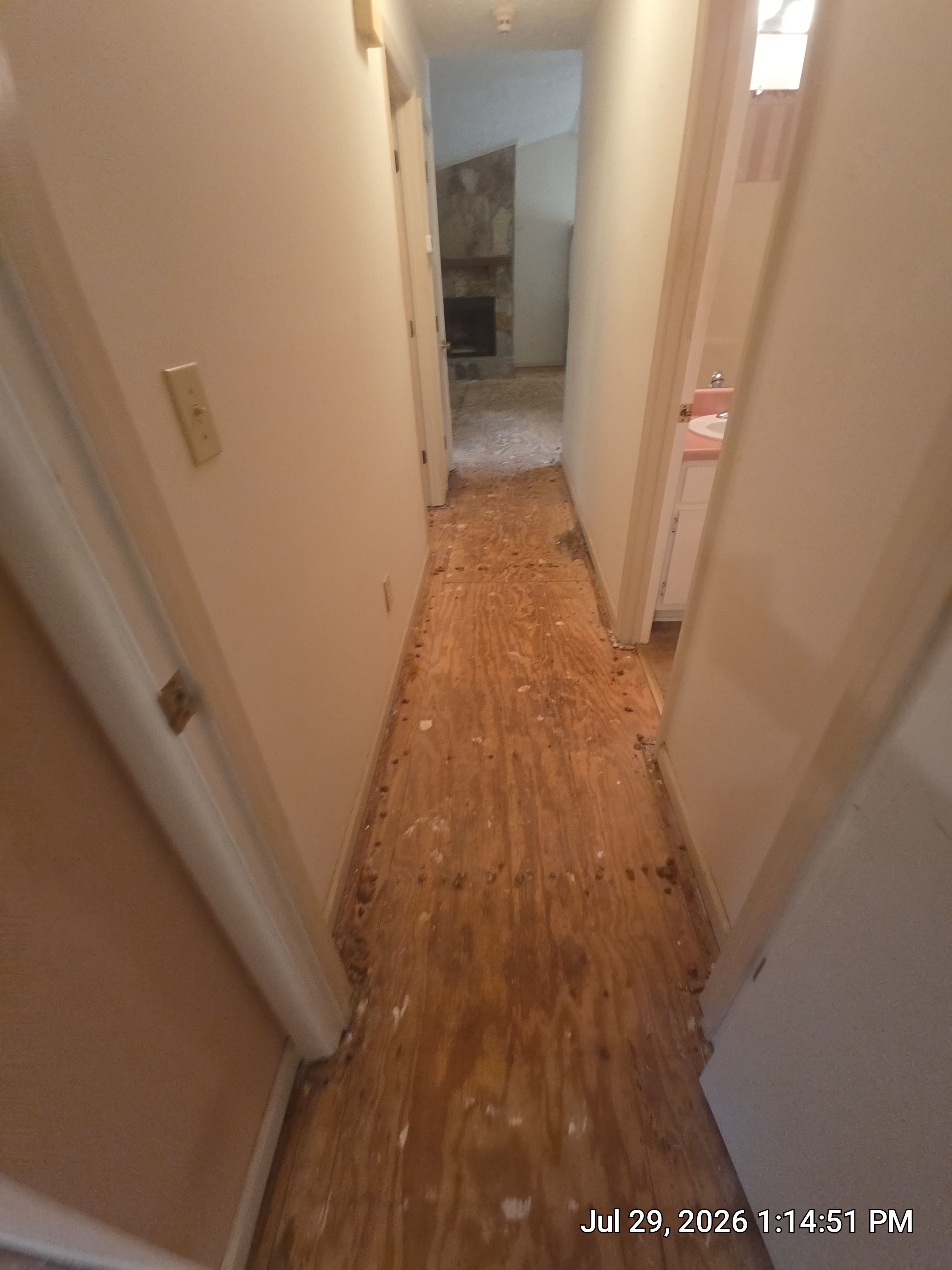 Full Home Subfloor Restoration and Luxury Vinyl Flooring Installation by Flooring Xpress CO