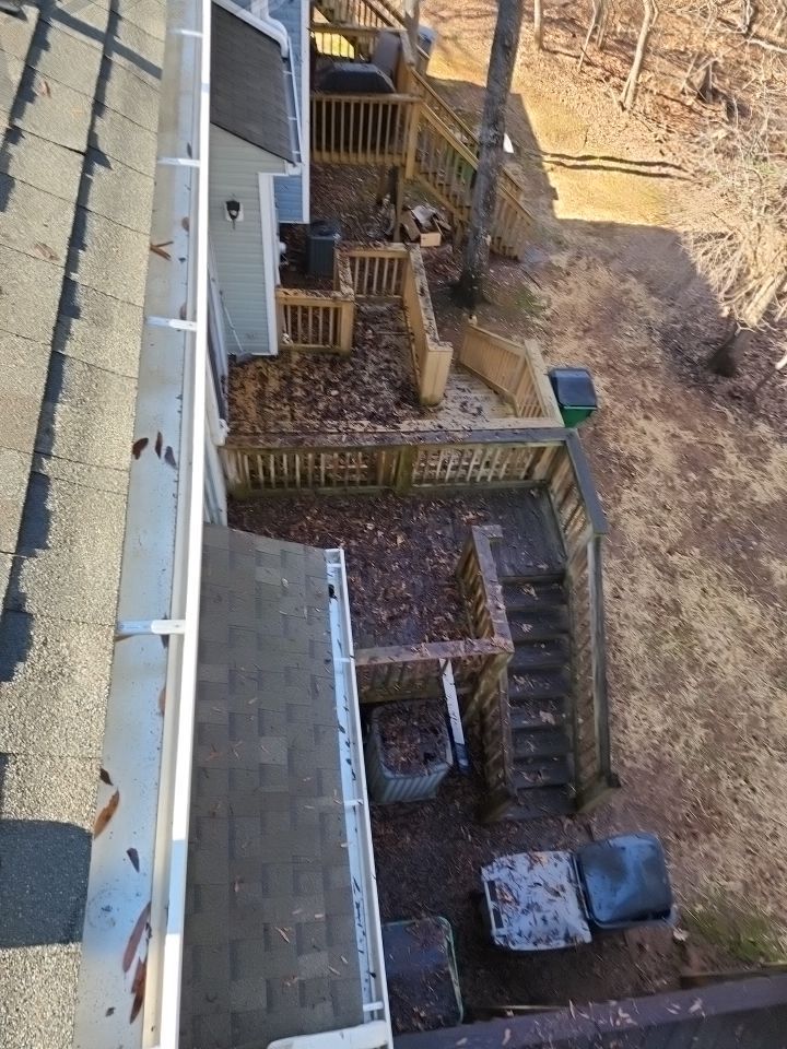 Gutter Cleaning using water by Power Wash Masters LLC