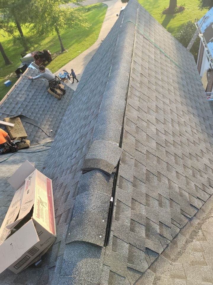 Residential Roofing Installation using Roof Replacement by American Roofing & Construction LLC