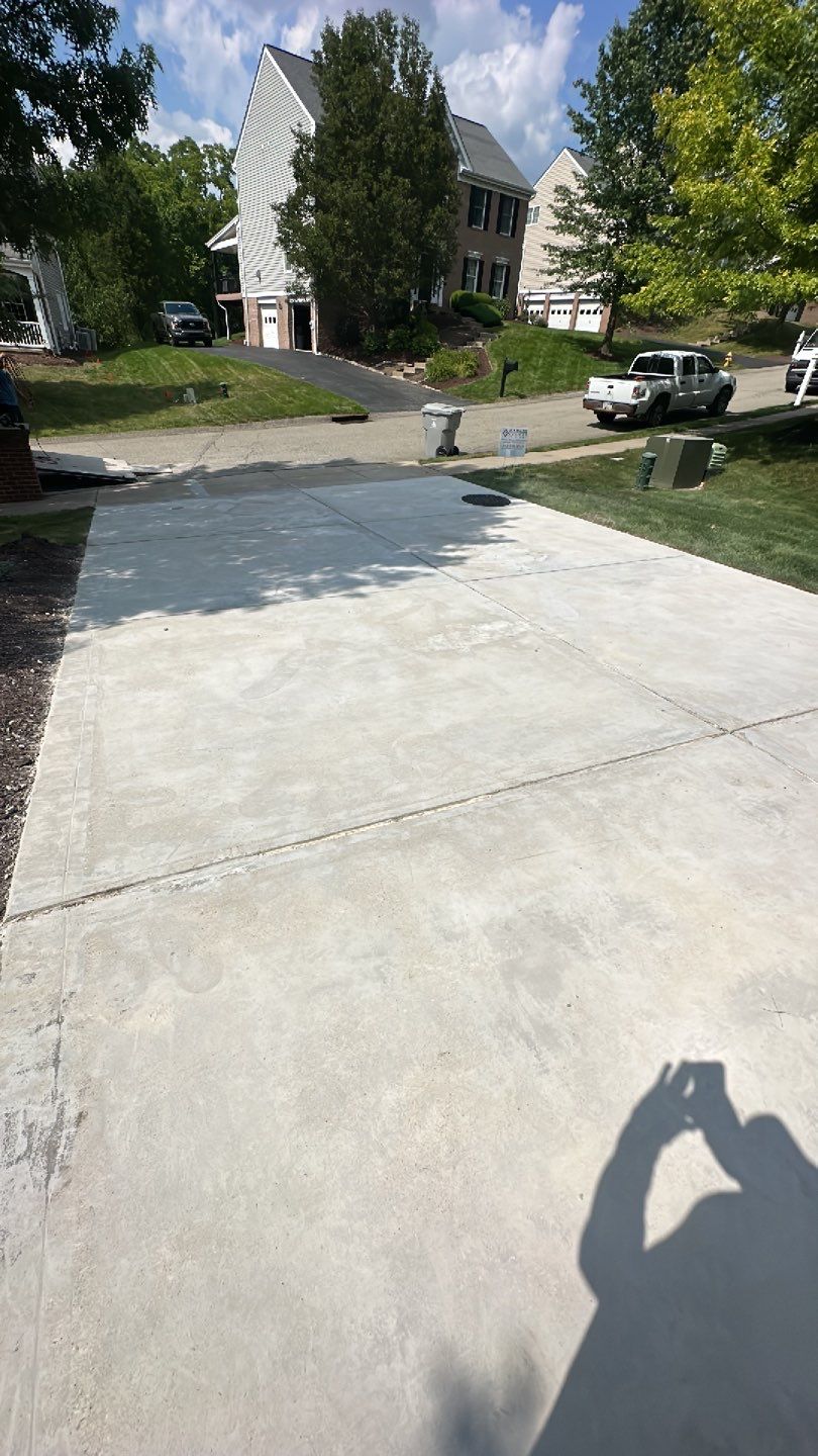 Pool Deck + Driveway + Garage Project in Venetia by Floors in a Day, Inc