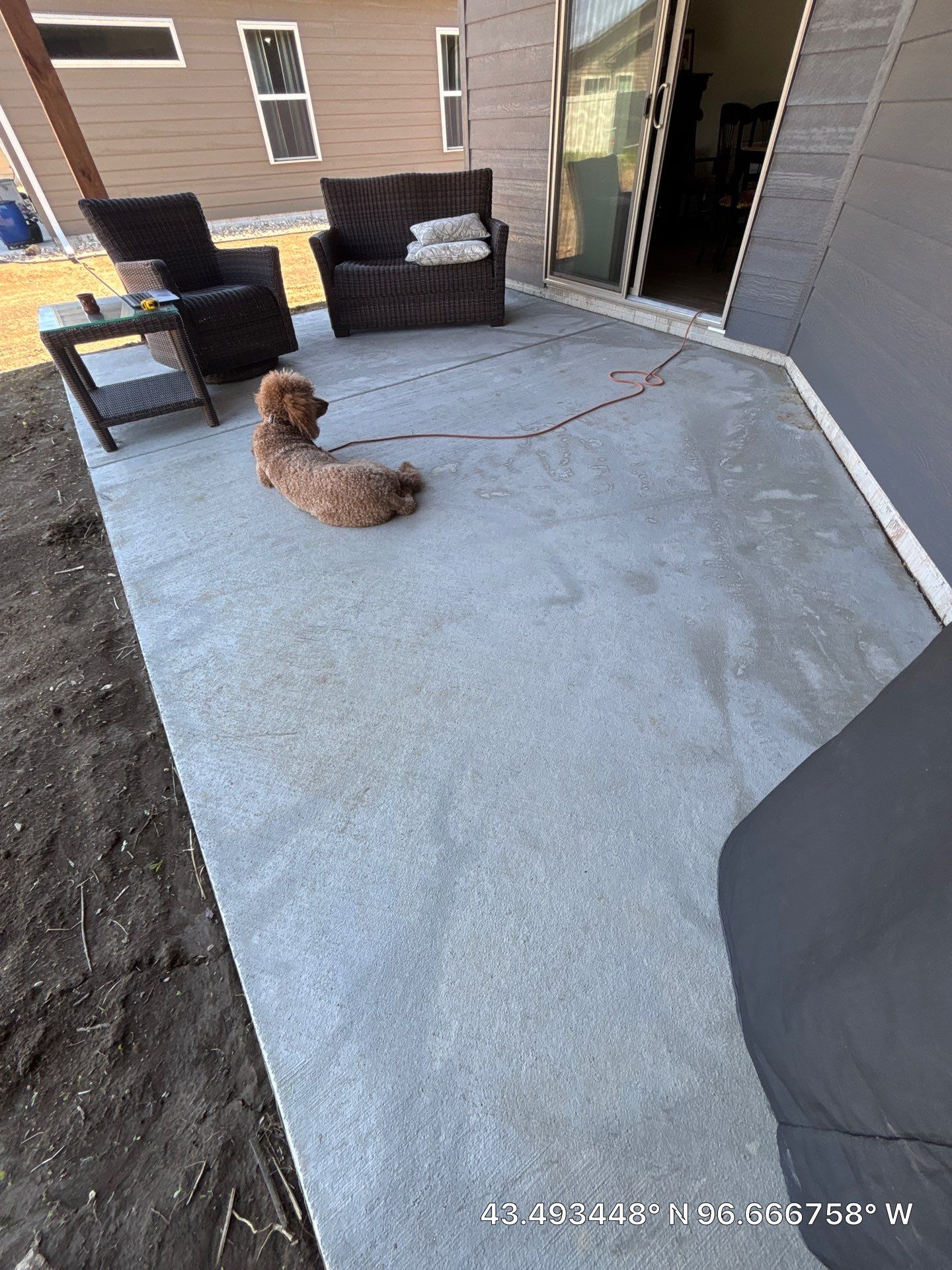 Sioux Falls Residential Concrete Patio and Walkway Coating by Select Painting, Coatings & Garage Cabinets