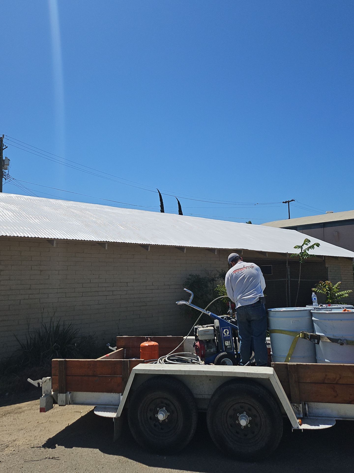 Spray foam and coatings using Conklin Benchmark/PUMA XL by Straight Edge Roofing Inc