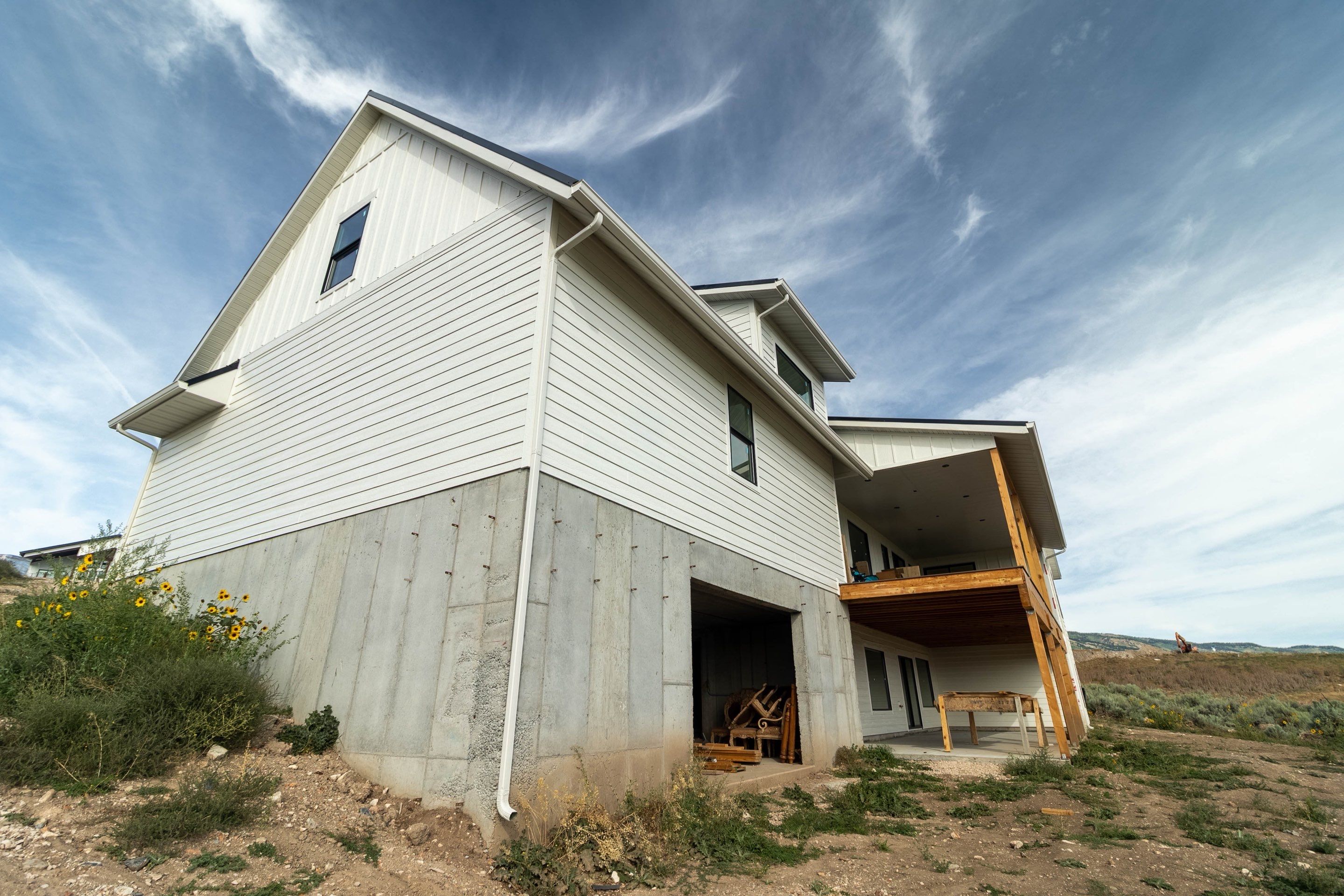 LP SmartSide Siding and Metal Roofing Installation in Garden City by Garner Construction