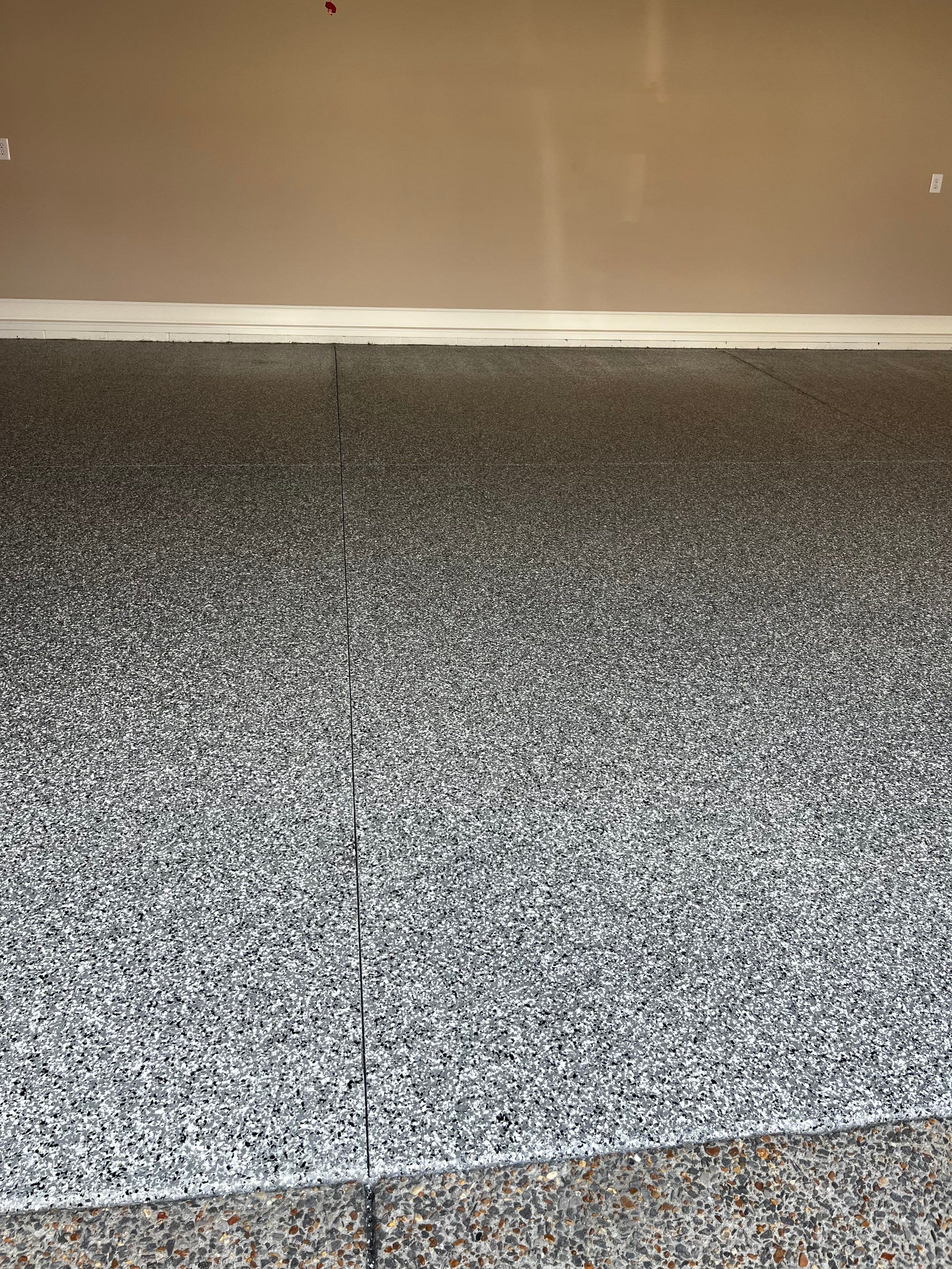 Garage Floor Coating using Wombat by My Garage Floor Guys