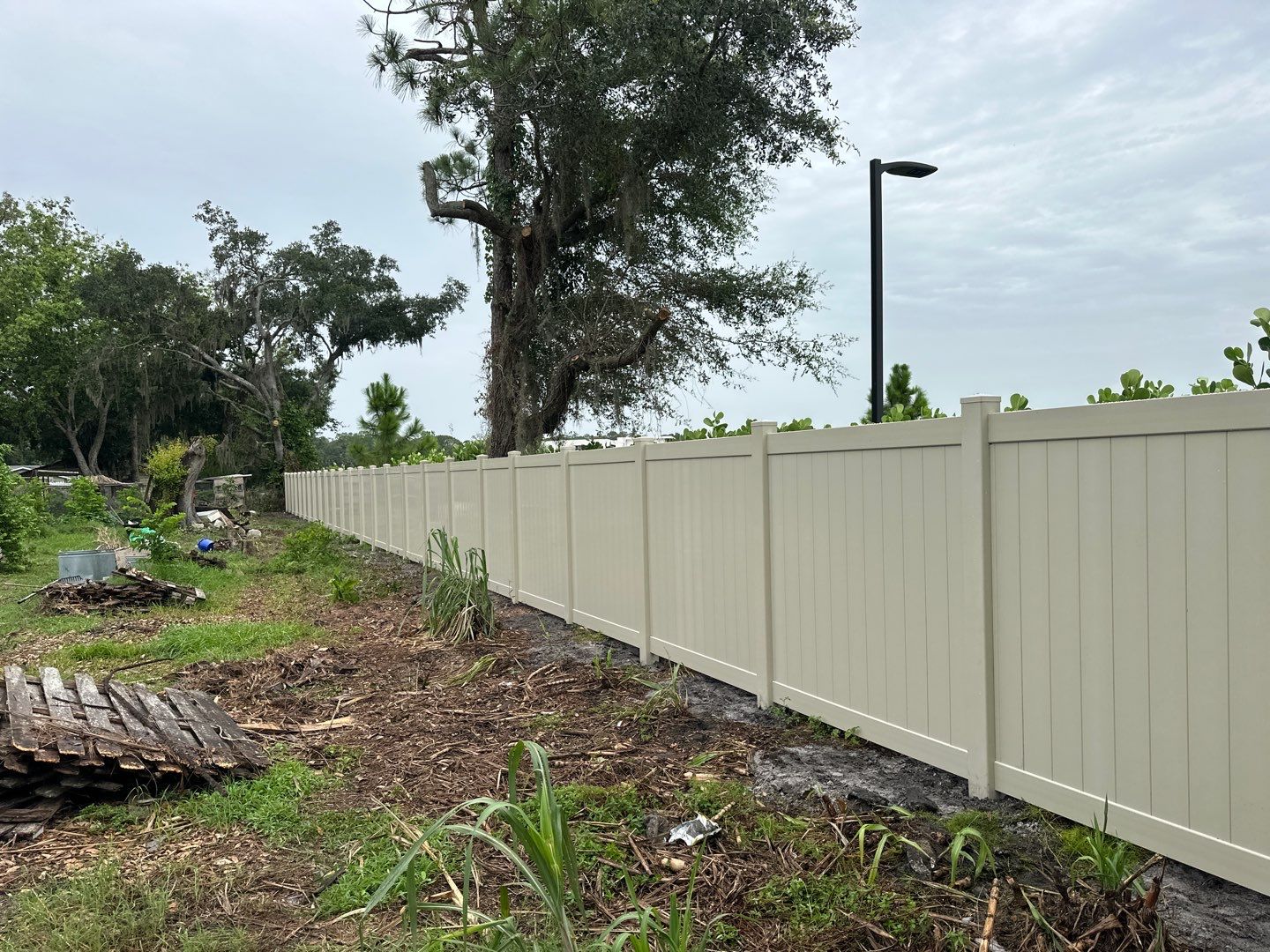 Vinyl Fence Installation using Tan Vinyl Privacy Fence by Asap fence and gates, LLC