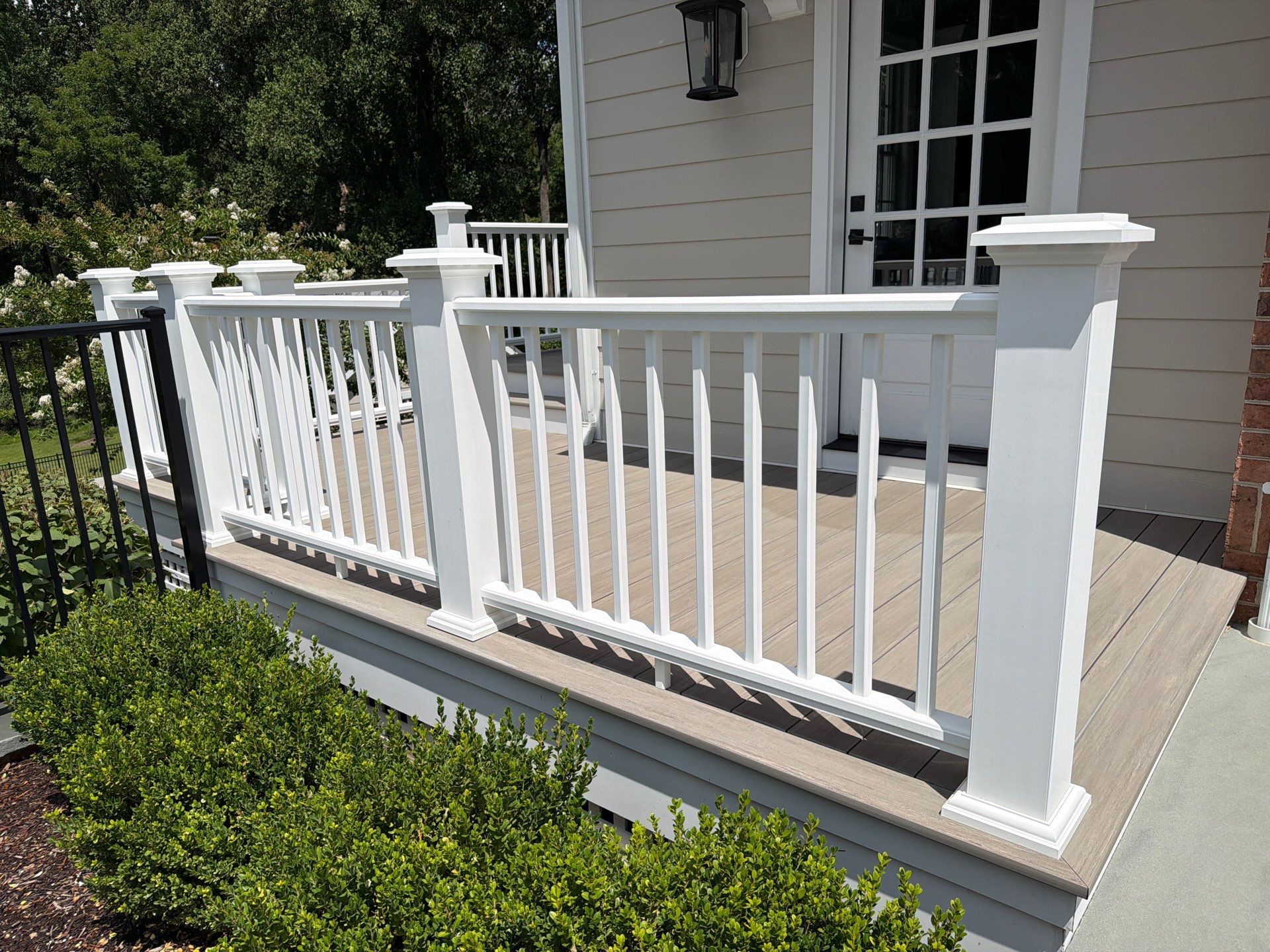 Composite Deck and Stone Paver Walkway power washing. by Baltimore Pressure Washers Inc.