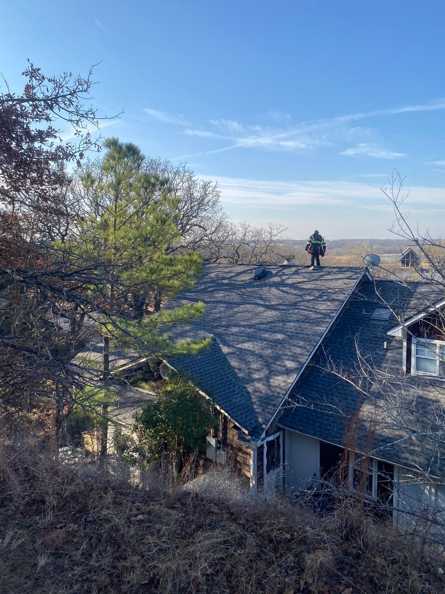 Roof Replacement on a private lake near Ardmore by BANA Roofing and Solar Supply