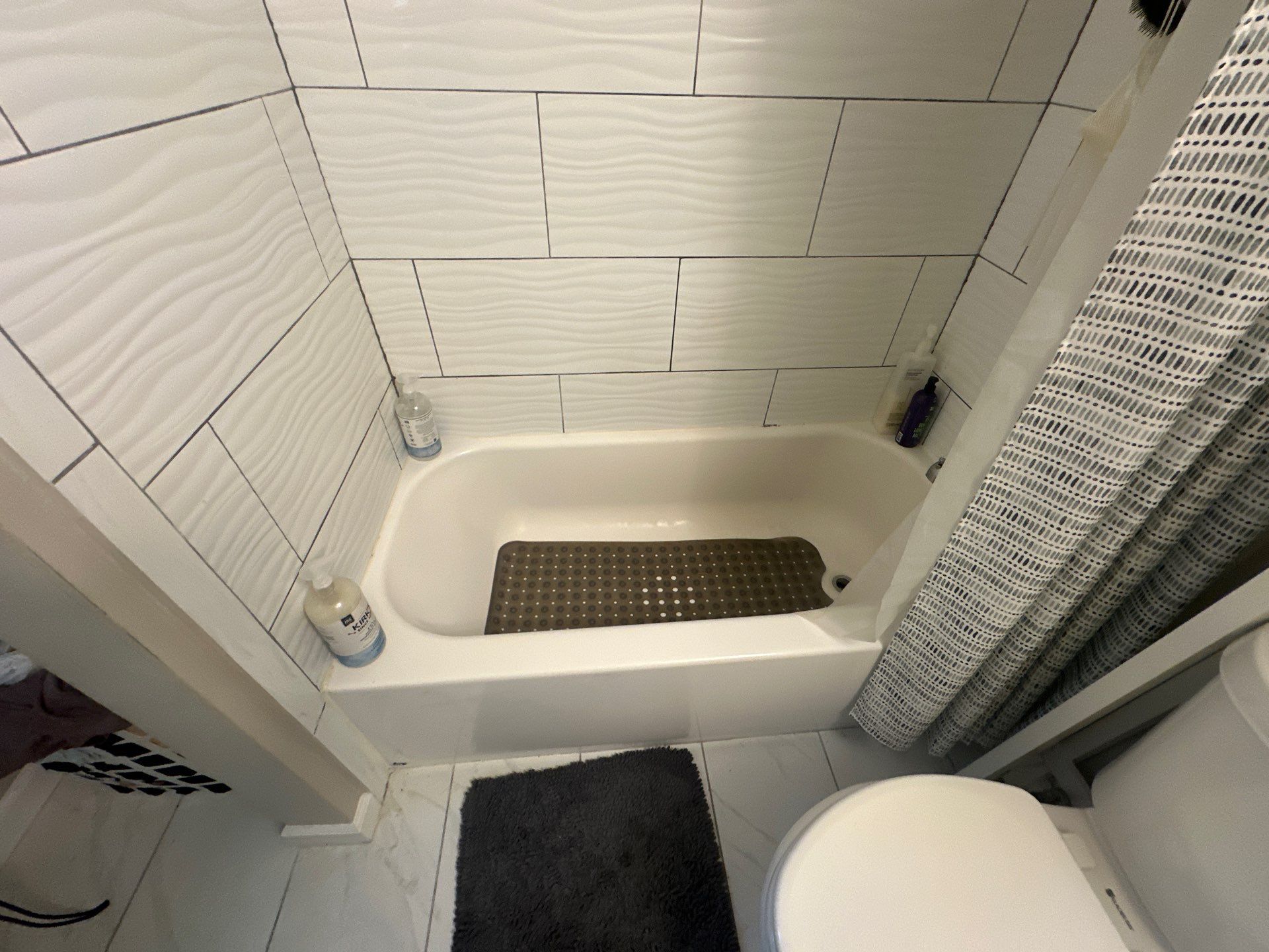 Tub to walk-in shower conversion by Prudencio