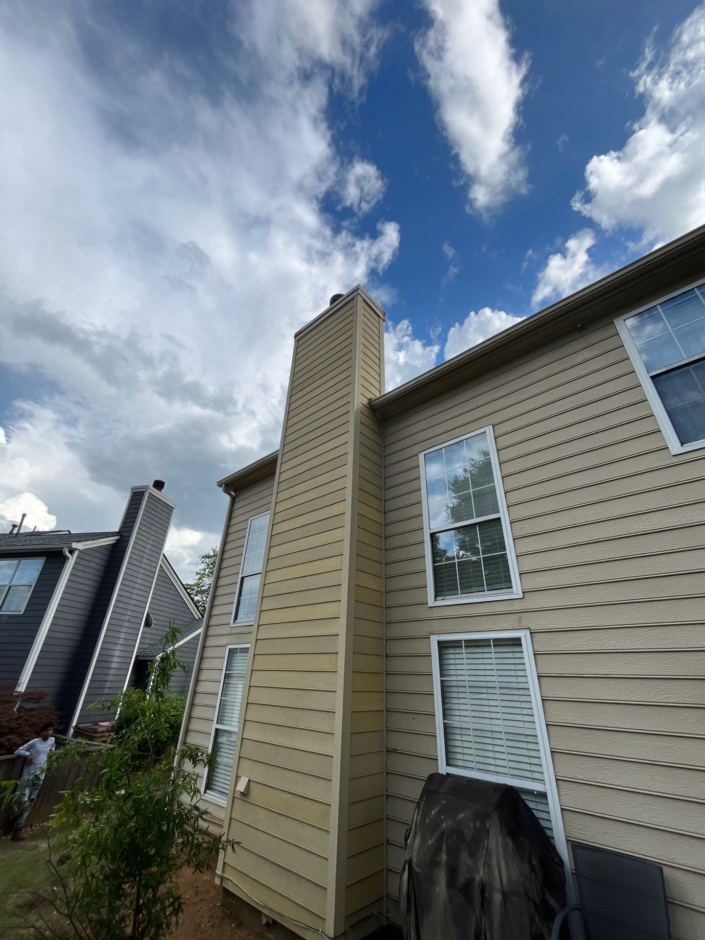 Chimney Siding Replacement and Exterior Painting in Duluth, GA by Nelson Exteriors