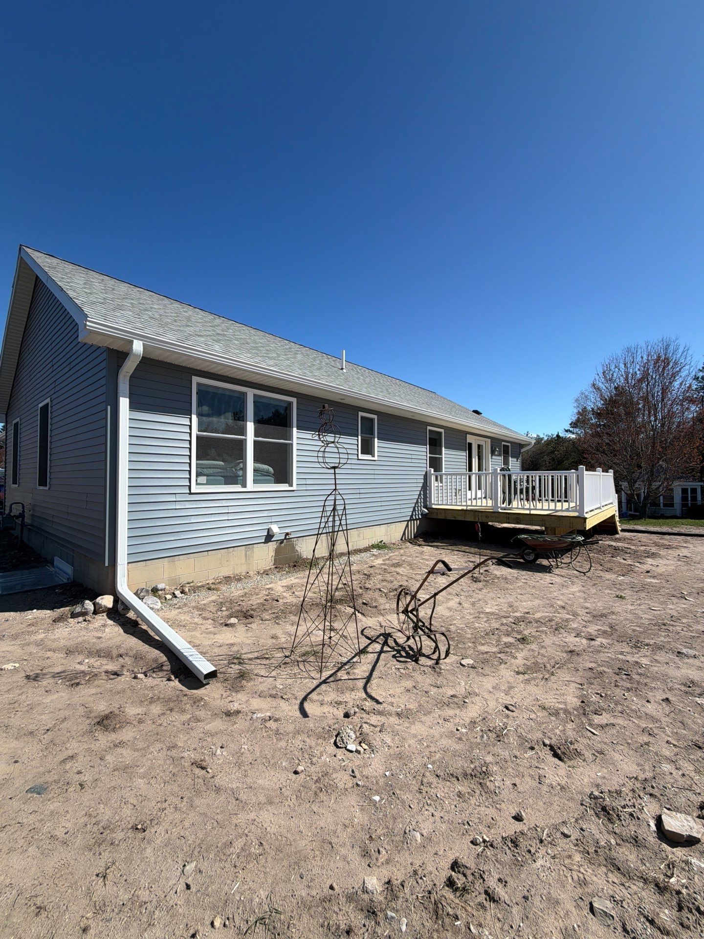 Gutter System Installation for New Home Construction in Petoskey by Rainbow Seamless Systems