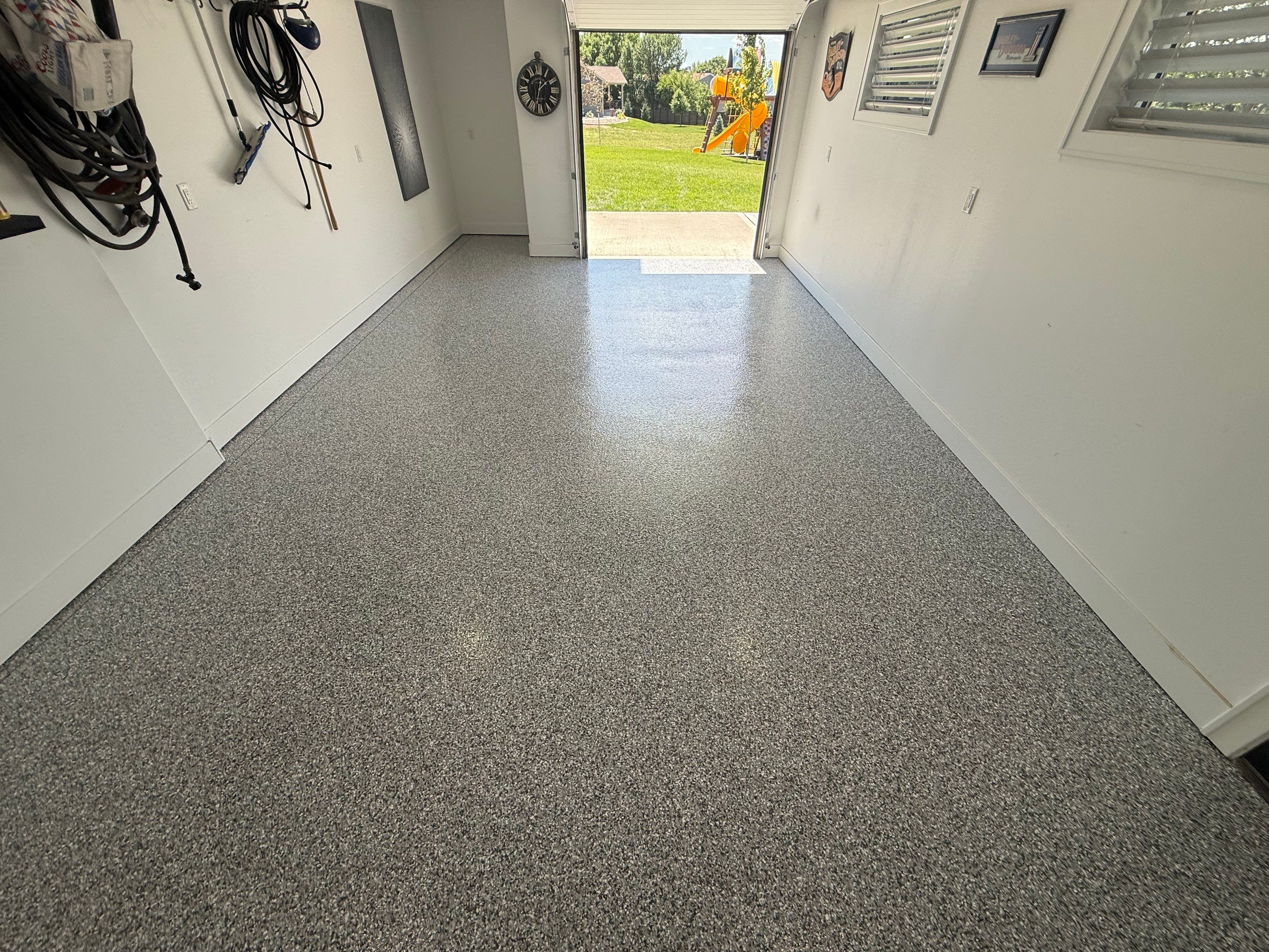 Gravel Flake Garage Floor Coating in Yankton by Select Painting, Coatings & Garage Cabinets
