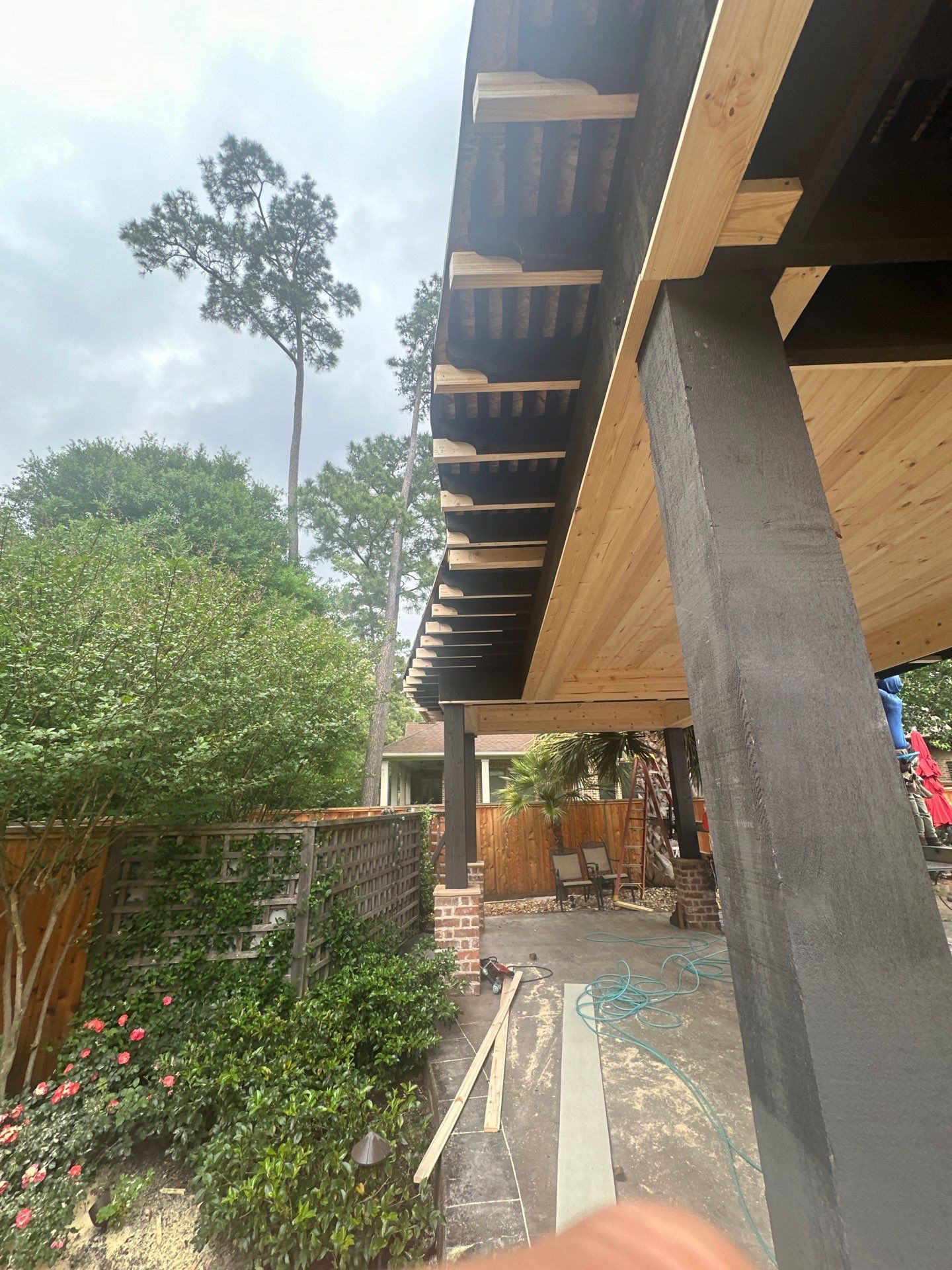 Covered Patio Remodel in The Woodlands by SophAlx LLC