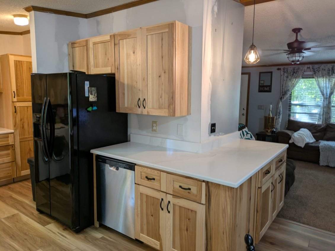 Stunning Kitchen Transformation with Raw Hickory Cabinets by A Step Above Handy LLC 