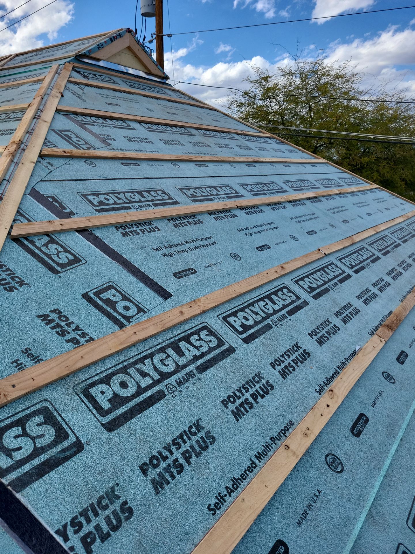 Metallic Silver Exposed Fastener by Reimagine Roofing