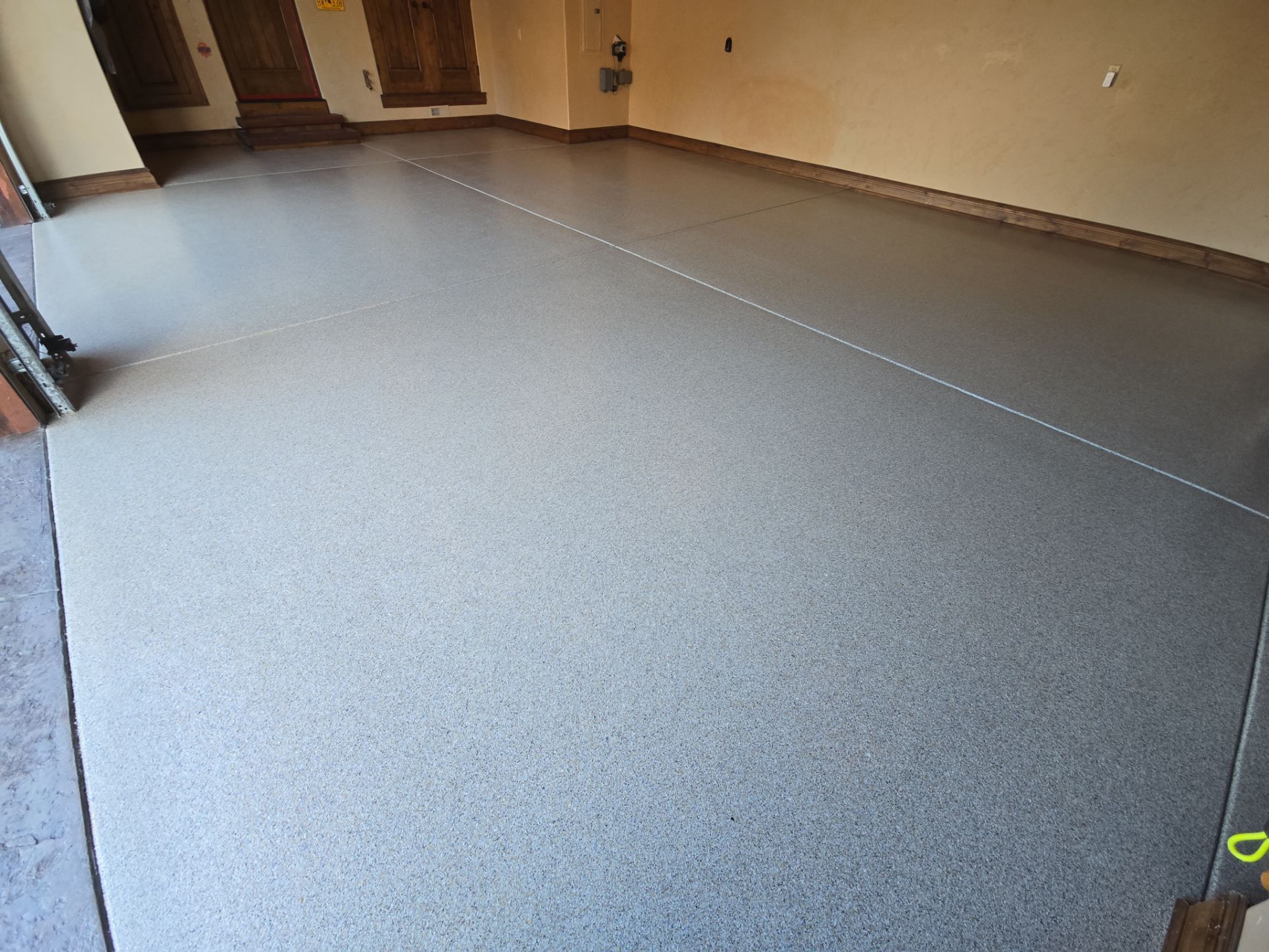 Garage Transformation using Stone/Marble Hybrid by Croc Coatings, LLC