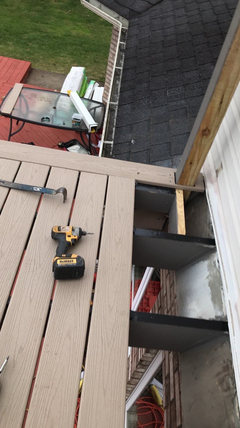 Deck Refurbush and Door Replacement using Trex Decking and Railing. Polaris Patio Doors by Secure Construction Company Inc
