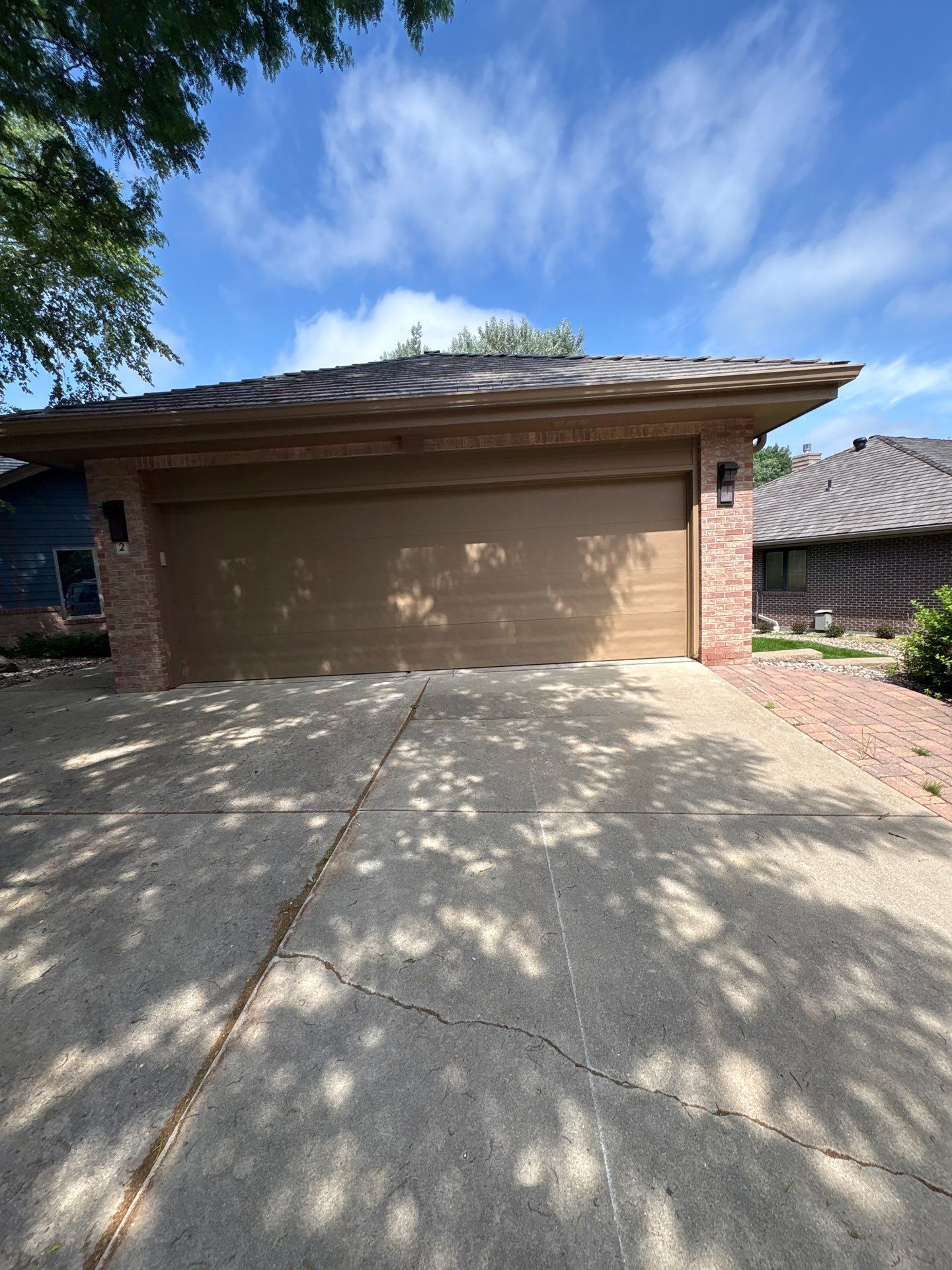 Residential Exterior Painting and Siding Refresh in Sioux Falls by Select Painting, Coatings & Garage Cabinets