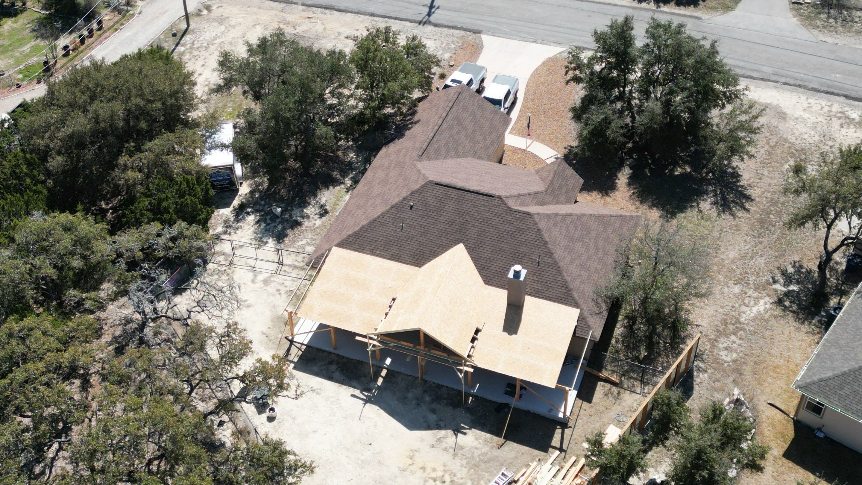 Reroof with Back Patio Addition using Owens Corning Duration Aged Copper by Lightning Exteriors