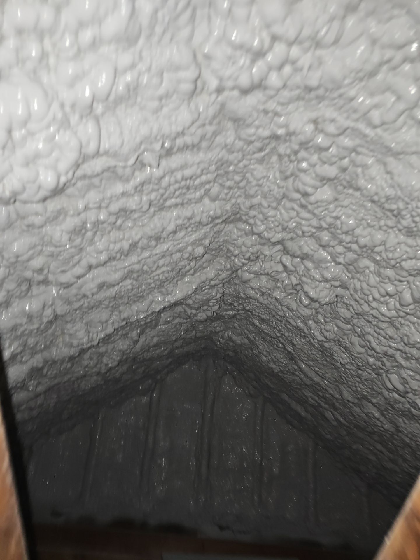 Attic Retrofit using open cell spray foam by NYS Foam & Energy