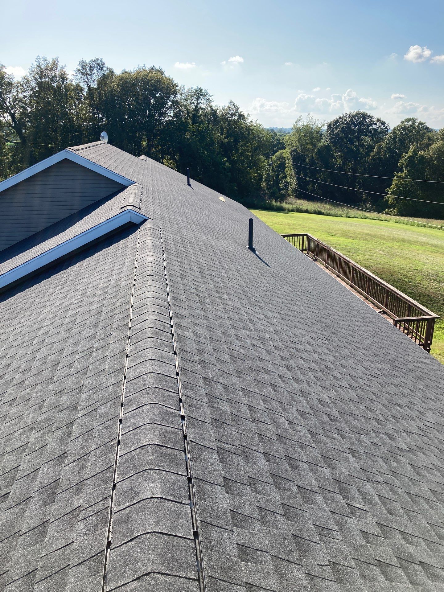 Residential Roofing Installation using GAF Timberline HDZ Charcoal by Rainstoppers Roofing