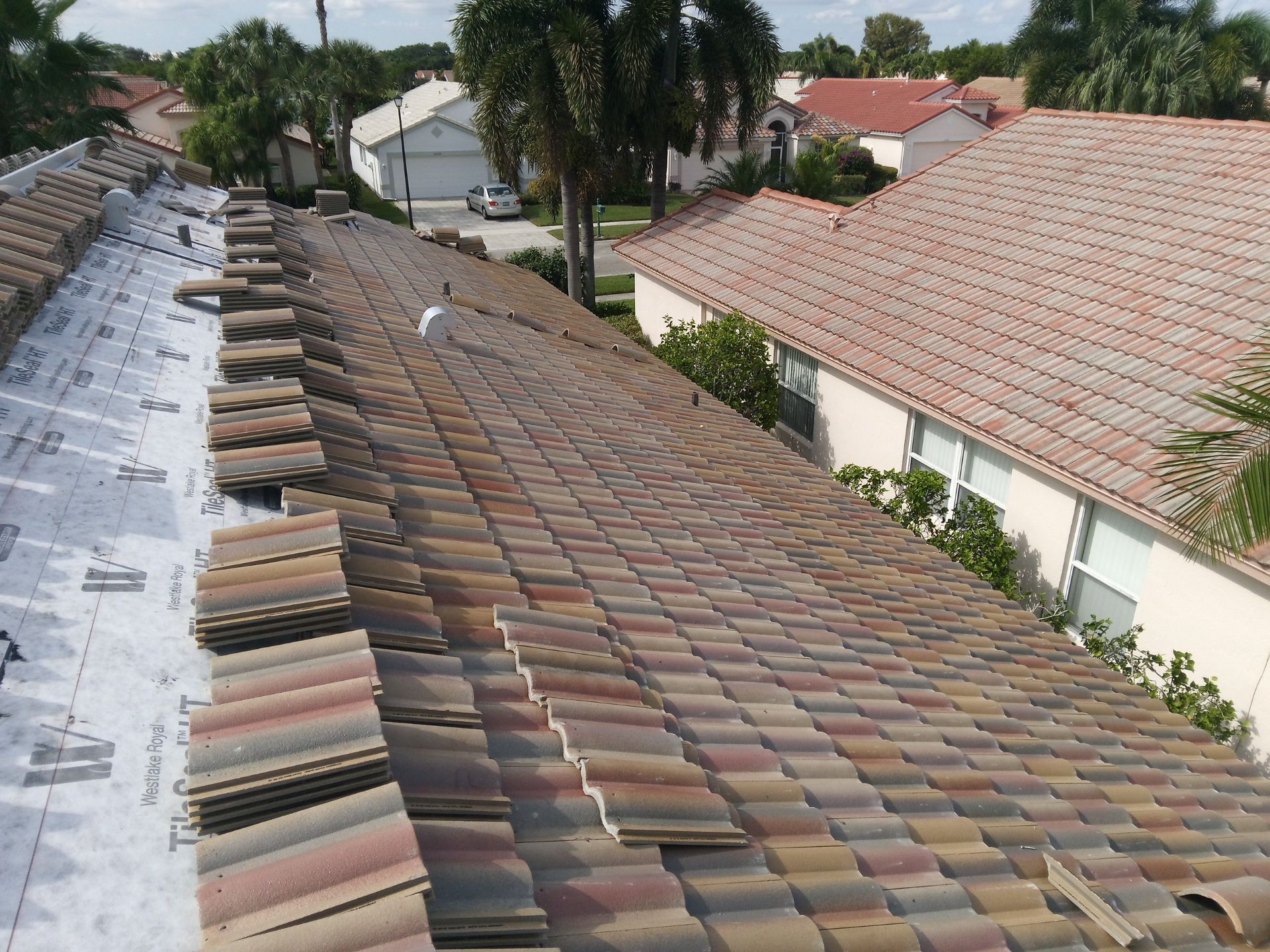 Concrete Tile Roof Replacement and Wood Decking Repair in Boca Raton by Aastro Roofing