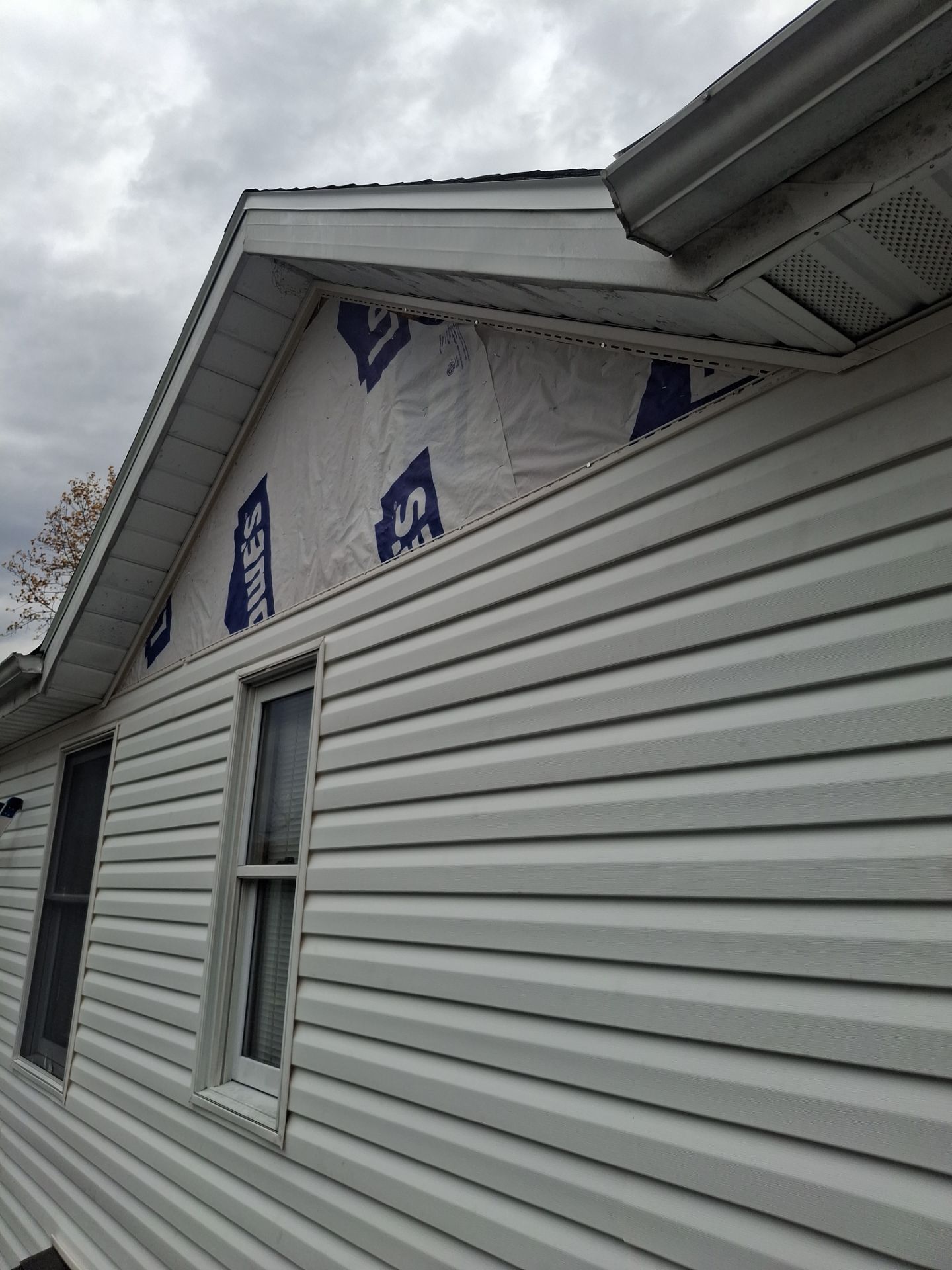 Residential Roofing Installation using GAF Timberline HDZ Oyster Grey by Rainstoppers Roofing