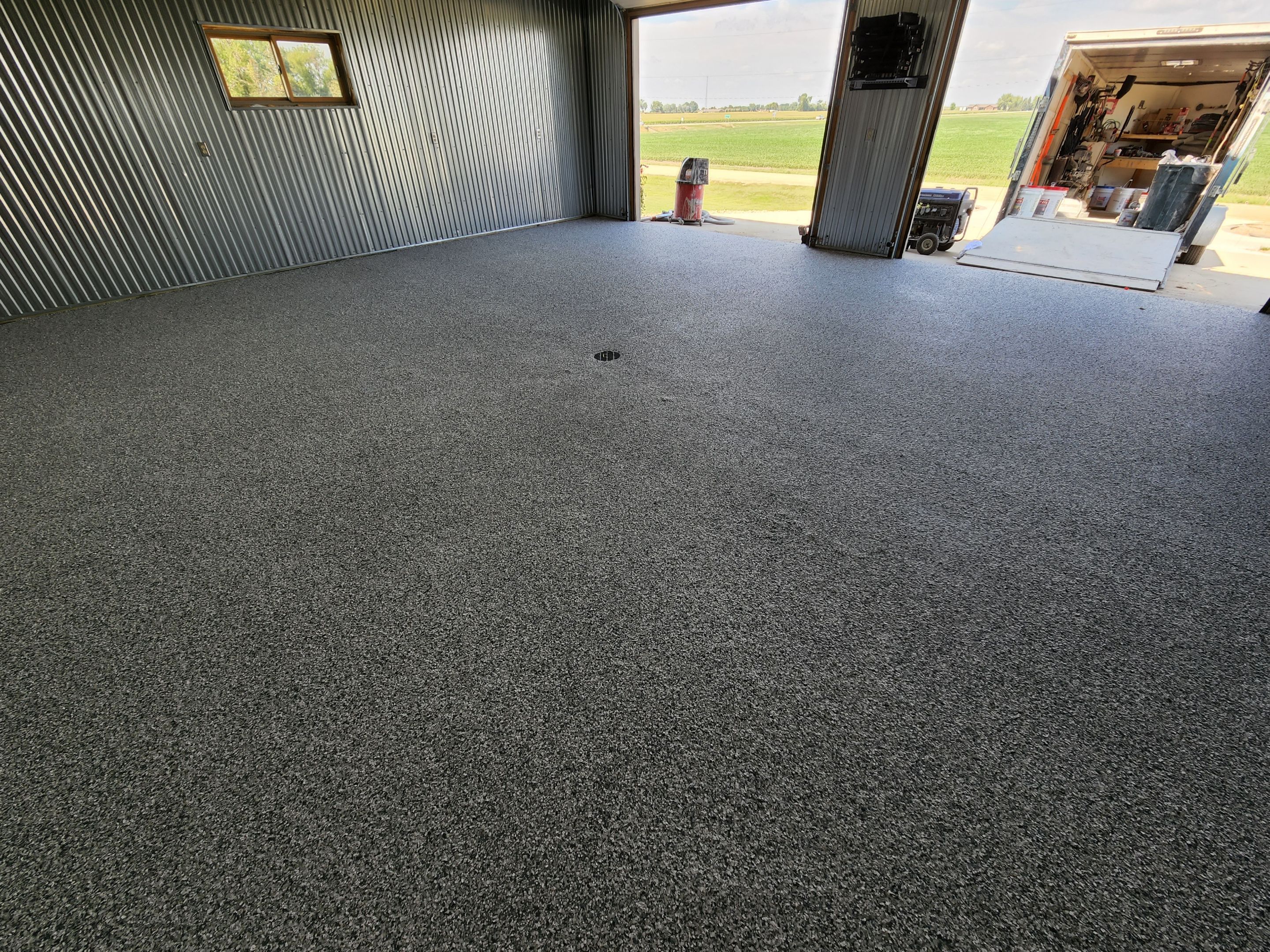 Garage using Slate Stone by Select Painting, Coatings & Garage Cabinets