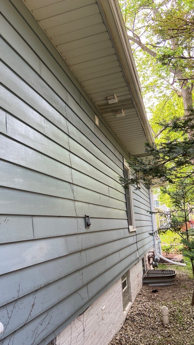Asphalt Roof, Vinyl Siding, and Aluminum Gutter Replacement by Custom Installations
