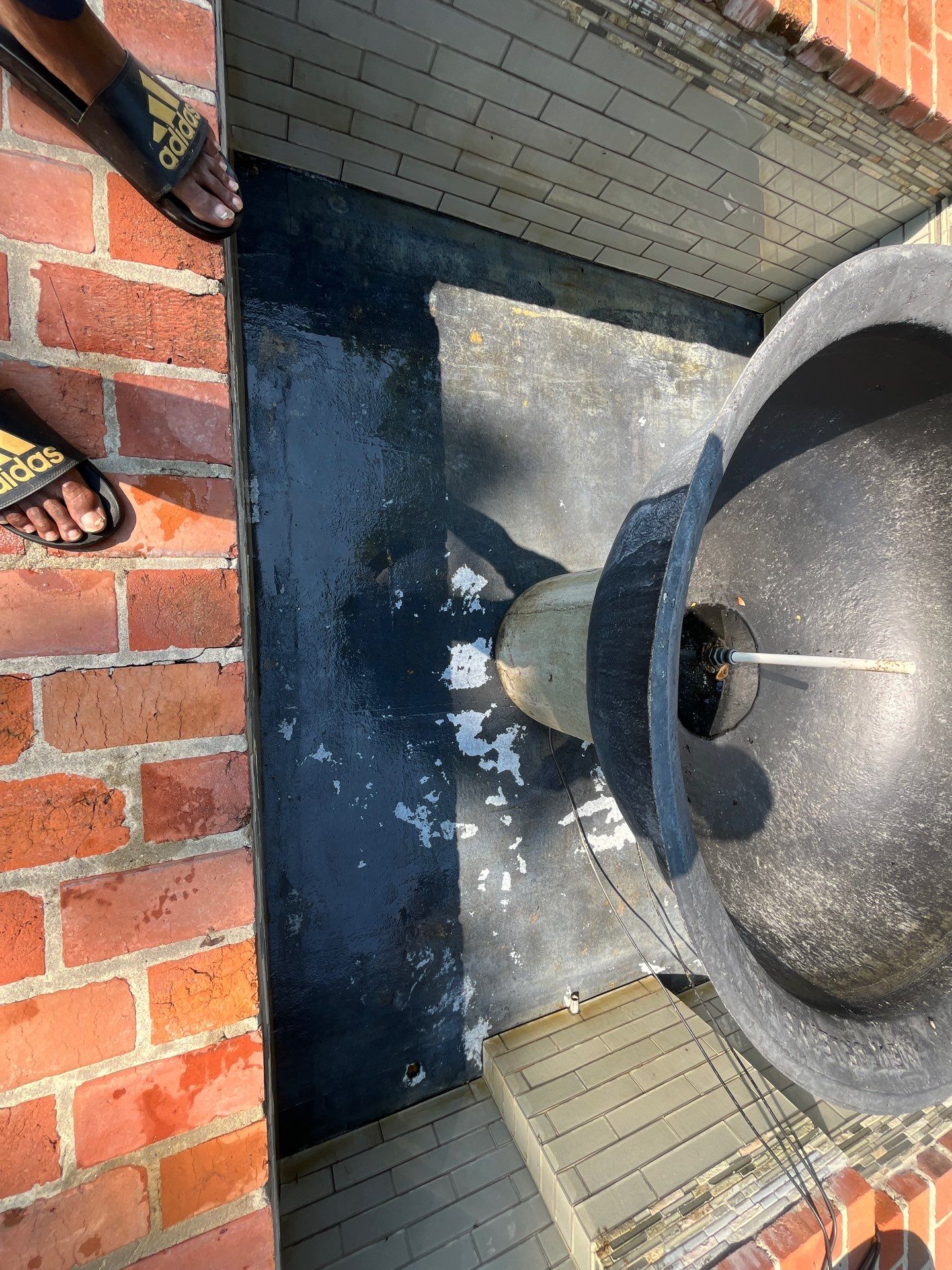 Pool Cleaning using Pool Cleaner by College Bros Outdoor services