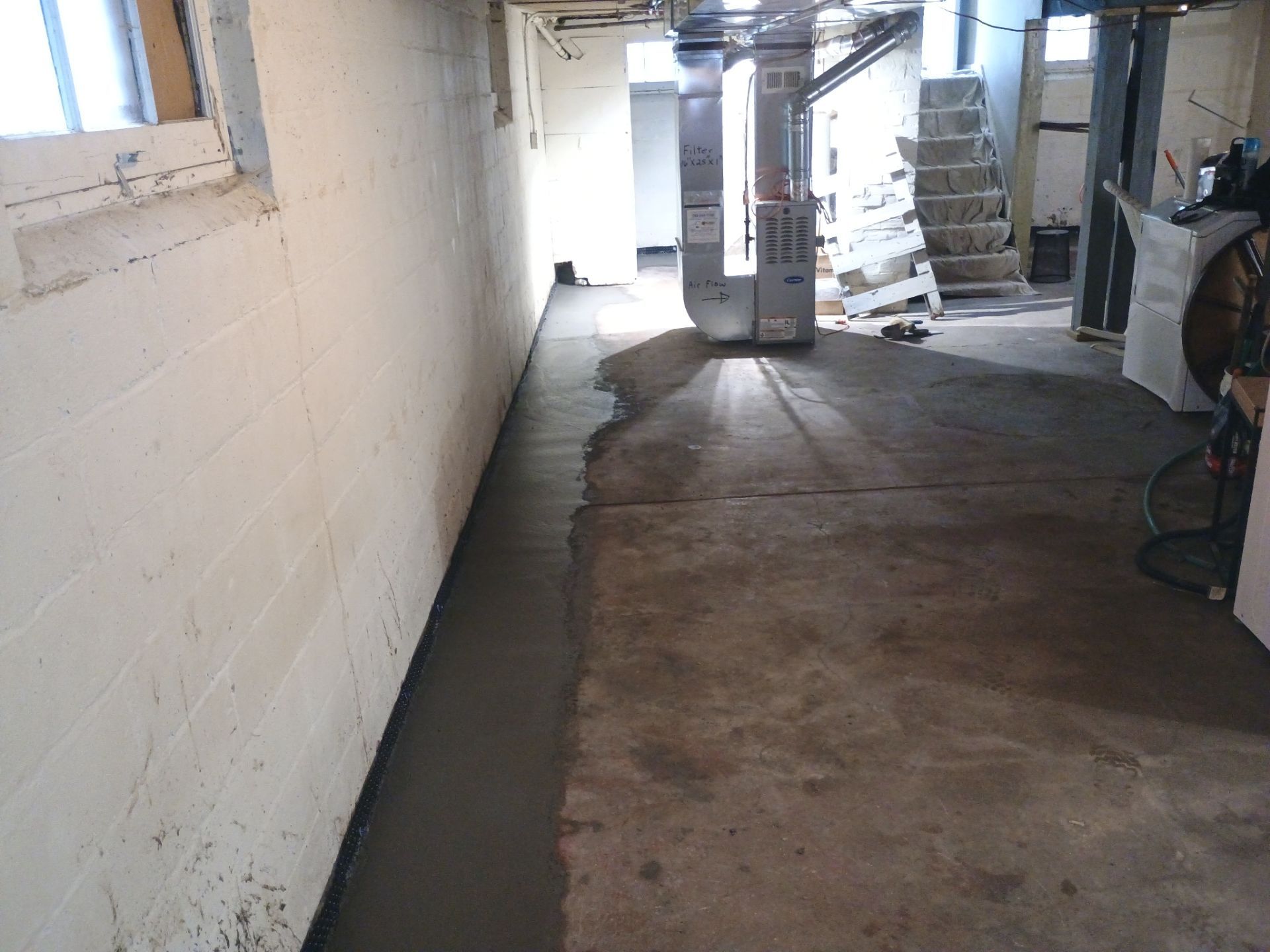 Interior Drain Tile & Sump Pump System in North Minneapolis by Waterproofing Northeast