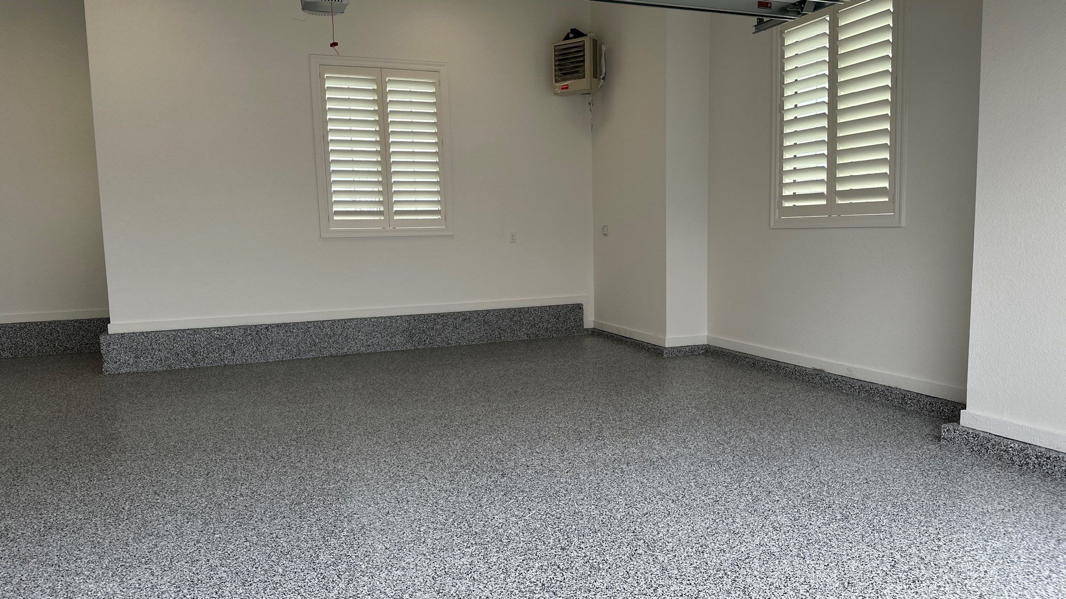 Mike & Pam transformed their garage with a Banner Garage Floor and Cabinets by Banner Garage