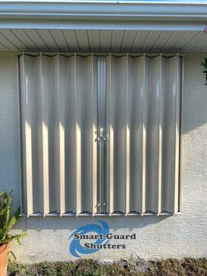 Accordion Shutters in Beige