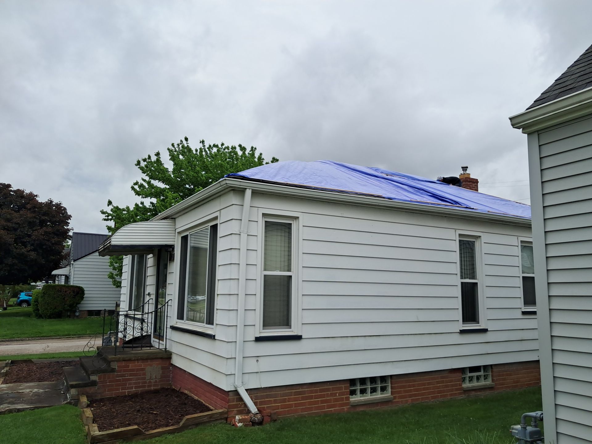 EMERGENCY TARPING ROOF BEFORE STORM using TARP by Absolute Roofing and Construction