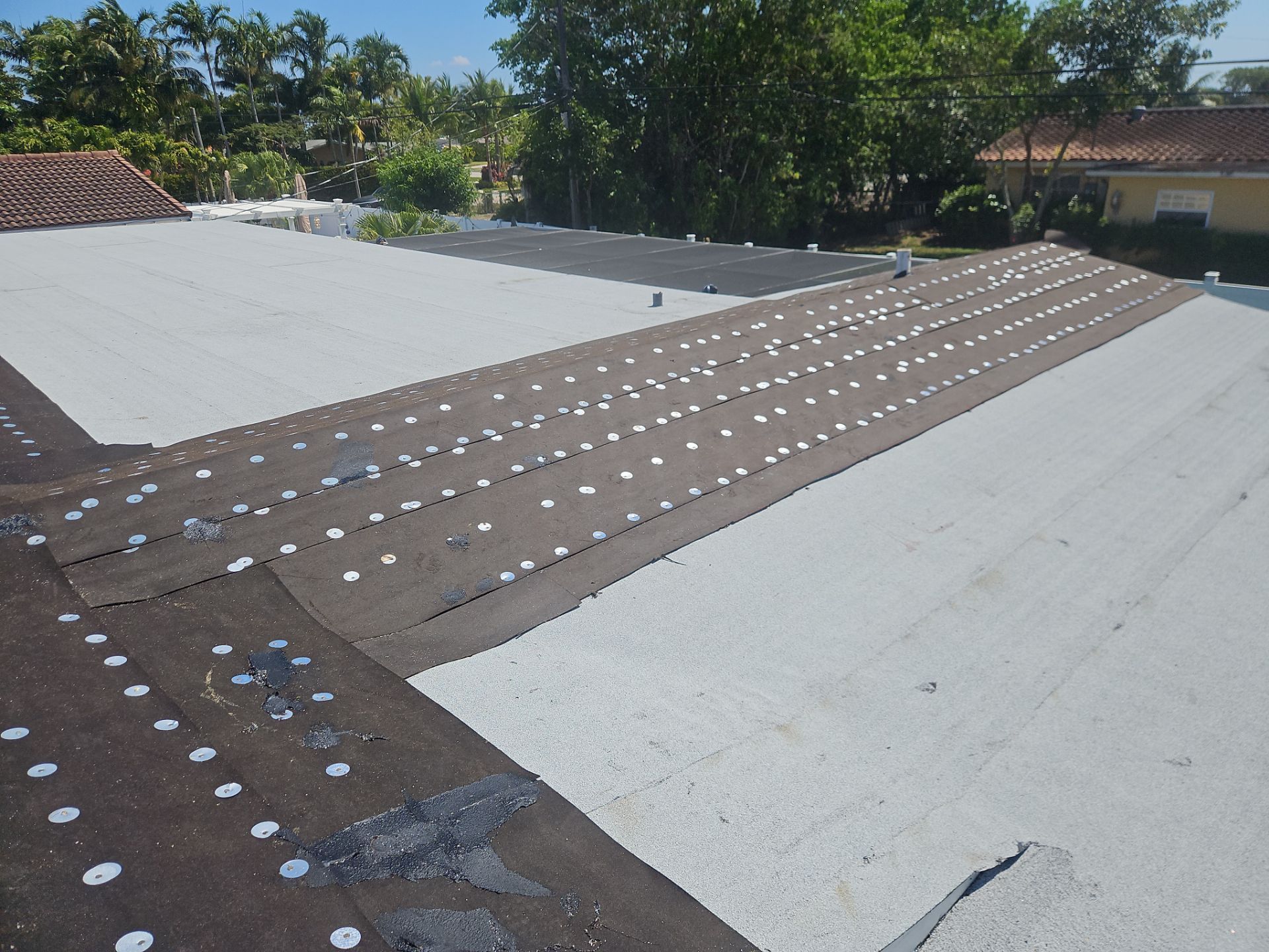 Residential Roofing Installation using 1" Nail strip metal roof by BLUES BROTHERS ROOFING