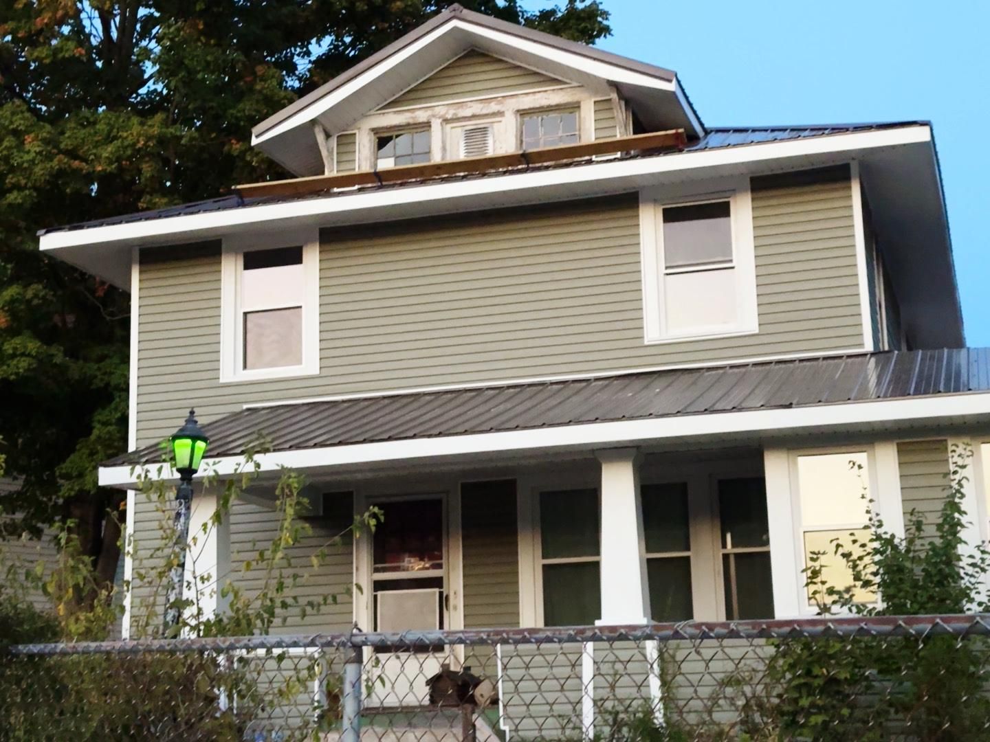 Roof Replacement using Metal by Rainstoppers Roofing