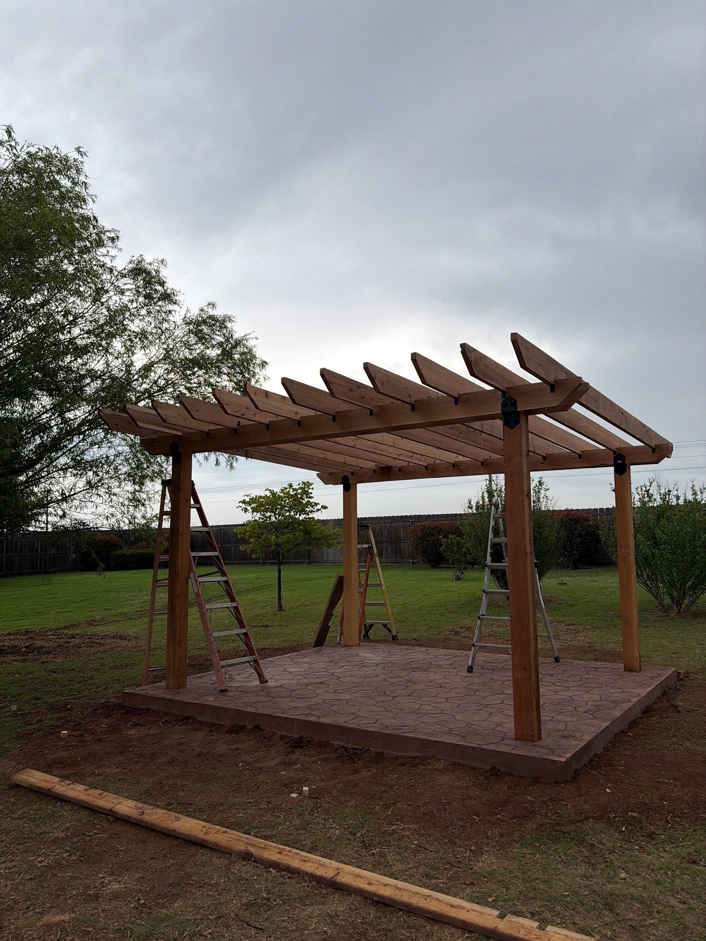 Stamped Concrete & Custom Pergola Build by Clays Services Inc
