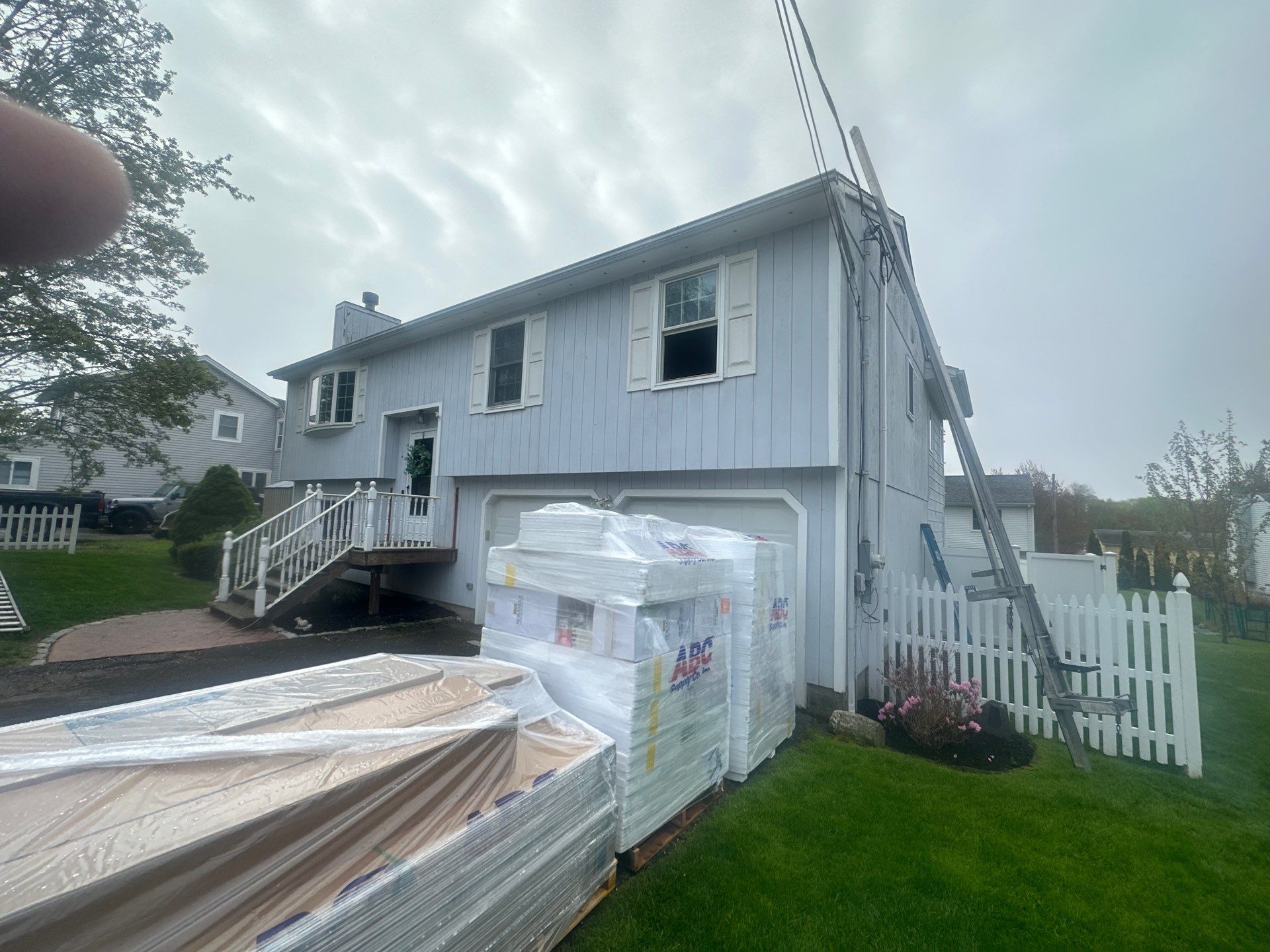 Siding Installation using Certainteed Cedar Impressions Straight Edge Perfection Shingles - D7 - Pacific Blue by A Plus Exterior