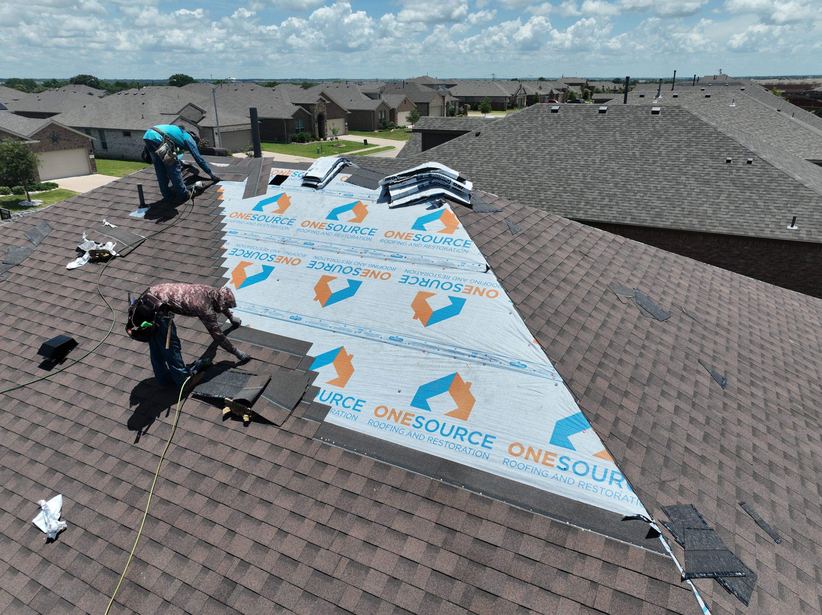 Residential Roofing Installation using IKO Cambridge Dual Brown by OneSource Roofing and Restoration
