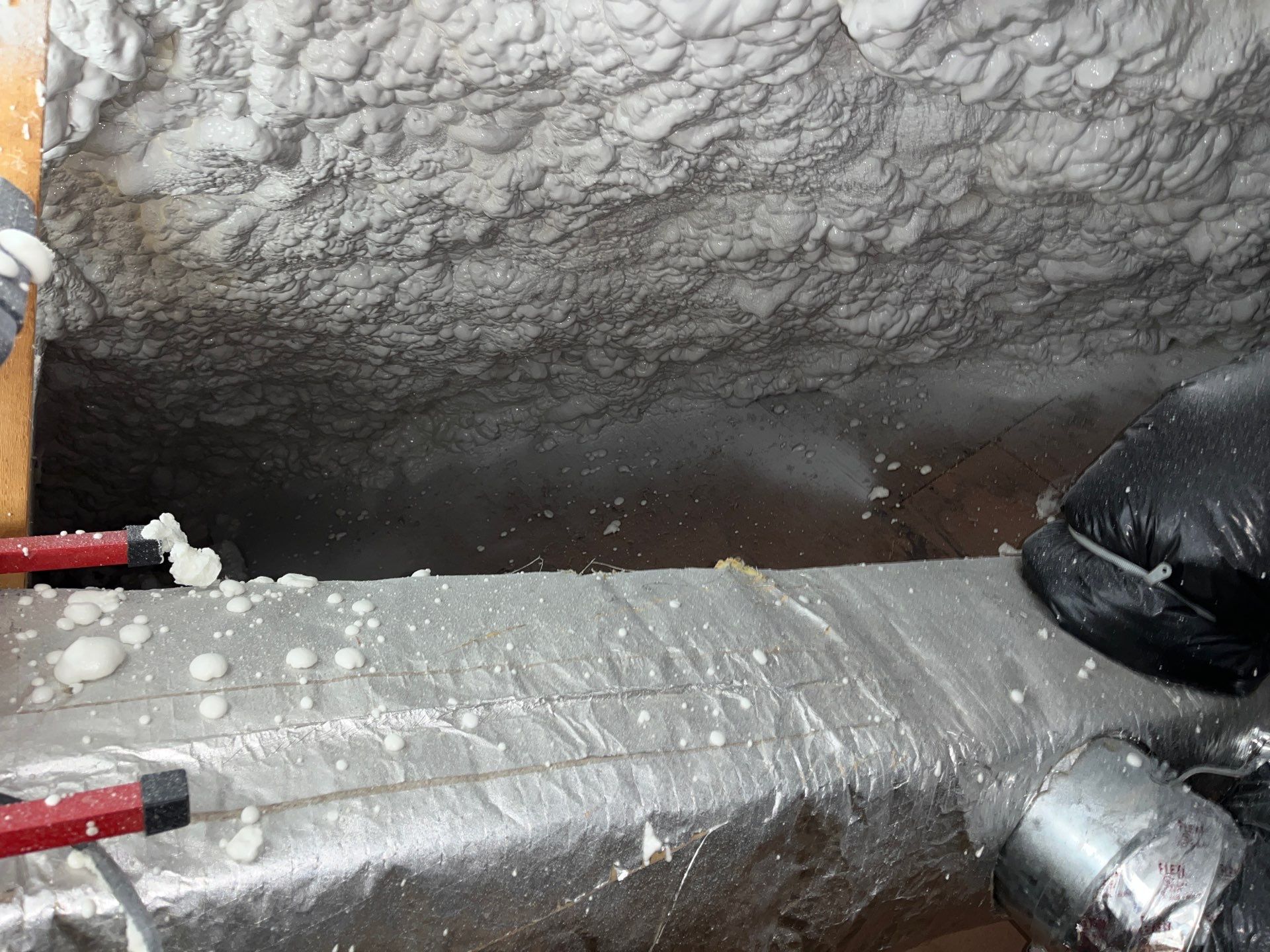 Attic Insulation using open cell spray foam by NYS Foam & Energy